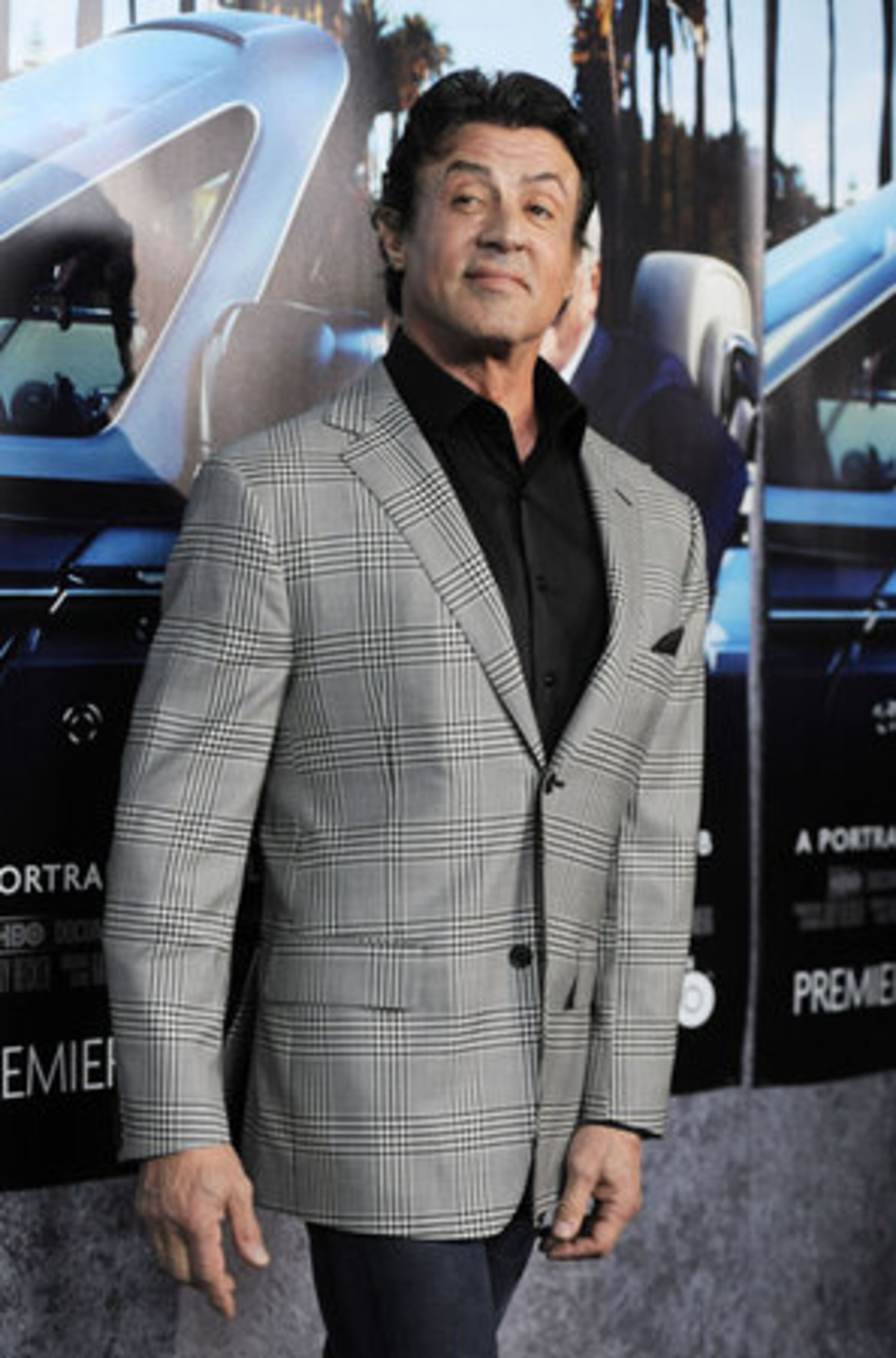 Sylvester Stallone arrives.
