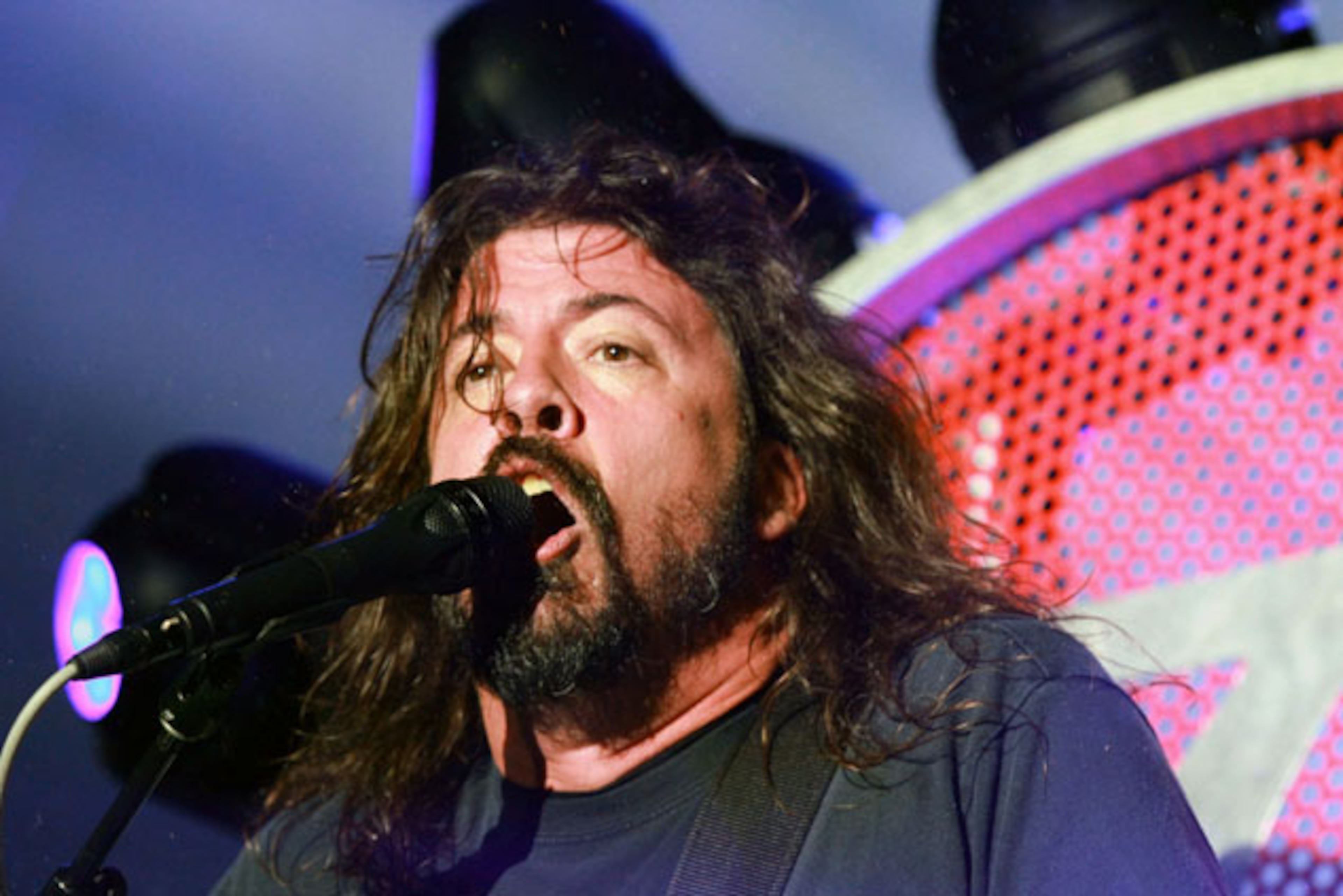Dave Grohl performs "Learn To Fly." Dave Grohl and the Foo Fighters packed over 20,000 fans into sold out Centennial Olympic Park Sunday night, October 4, 2015, with Gary Clark, Jr. opening the show. The light rain couldn't dampen the energy and spirit of the huge crowd. Grohl, who broke his leg while performing in Sweden in June, rocked out in a motorized throne, which was equipped with lights and carried numerous guitars. Robb D. Cohen/ RobbsPhotos.com