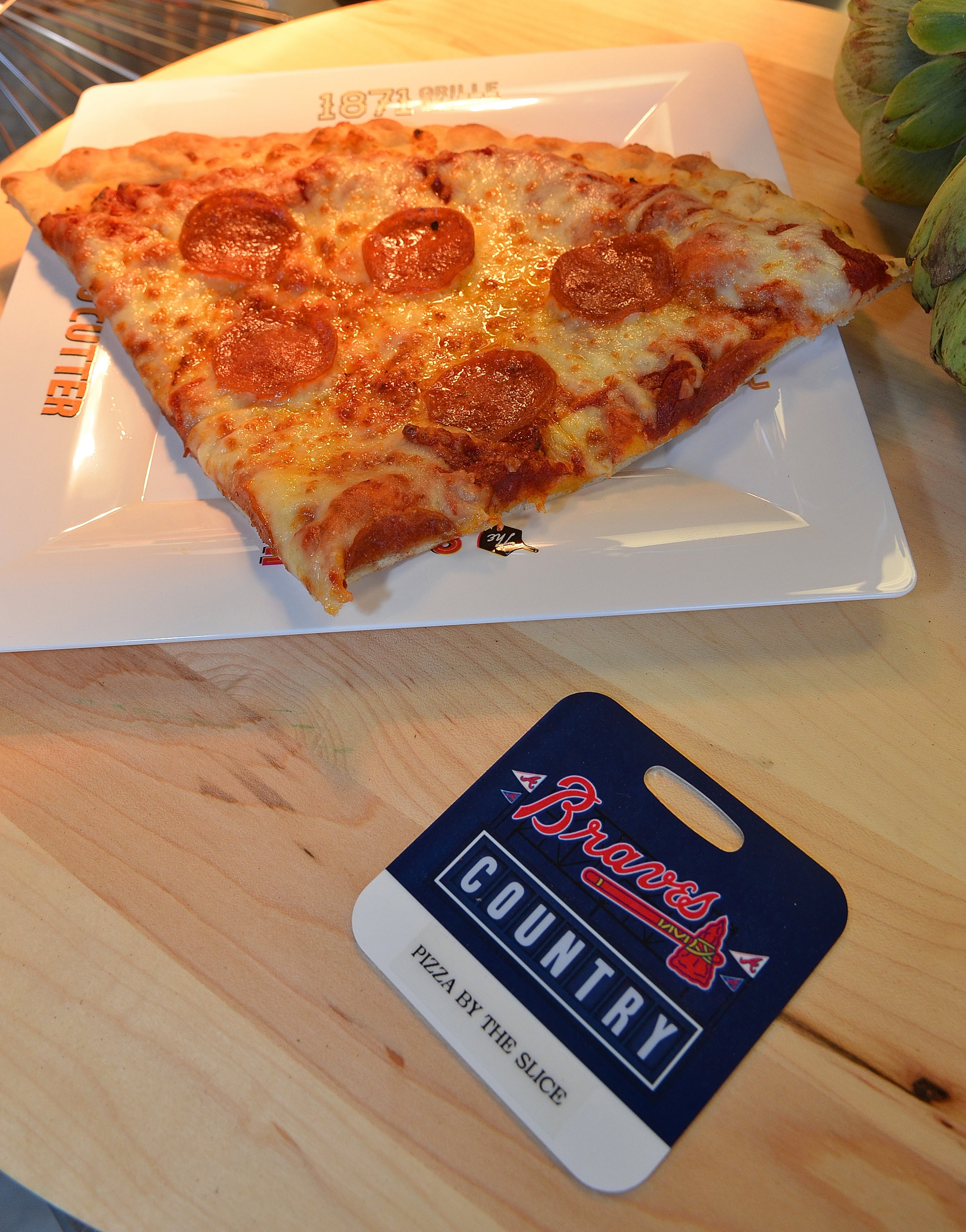 170323 Atlanta, Ga (Suntrust Park): Pizza by the slice from Slice will be available for the 2017 Braves season at Suntrust Park. The Atlanta Braves and Delaware North Sportservice, the hospitality and food service provider for the Atlanta Braves, host a tasting tour of the soon to be opened Suntrust Park to reveal the food and beverage options available for the 2017 season. All photos taken Thursday March 23, 2017 at Suntrust Park 755 Battery Avenue, Smyrna, Ga 30339. (Chris Hunt/Special) for story slugged 041417Bravesdishes