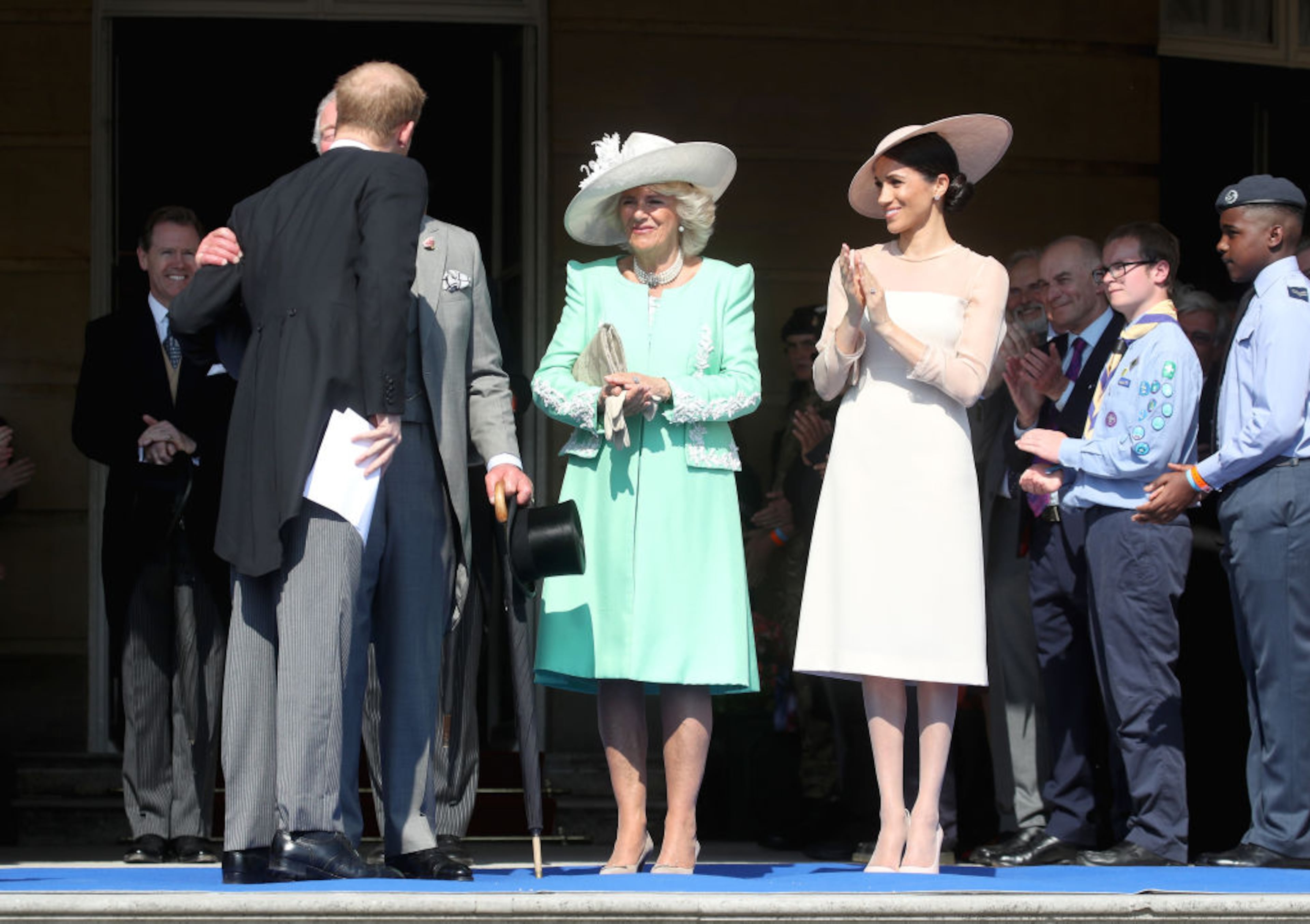 LONDON, ENGLAND - MAY 22: (L-R) Prince Harry, Duke of Sussex embraces his father, Prince Charles, Prince of Wales as they attend with Camilla, Duchess of Cornwall and Meghan, Duchess of Sussex The Prince of Wales' 70th Birthday Patronage Celebration held at Buckingham Palace on May 22, 2018 in London, England. (Photo by Chris Jackson/Chris Jackson/Getty Images)