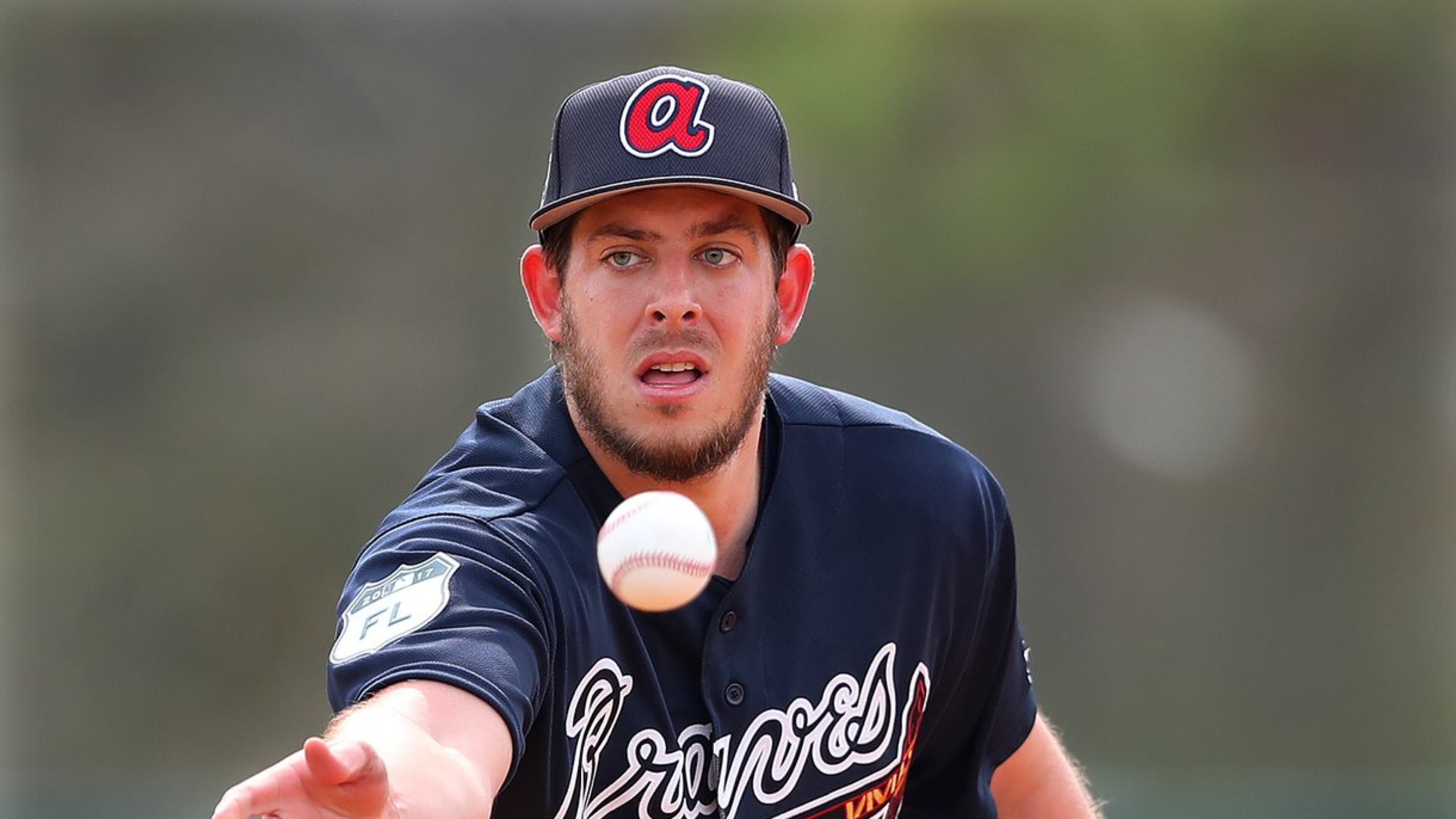 Braves pitcher Aaron Blair, pictured in an early spring training workout, recovered after a leadoff homer in the first inning Thursday to pitch a solid 2 2/3 innings against the Yankees. (Curtis Compton/ccompton@ajc.com)
