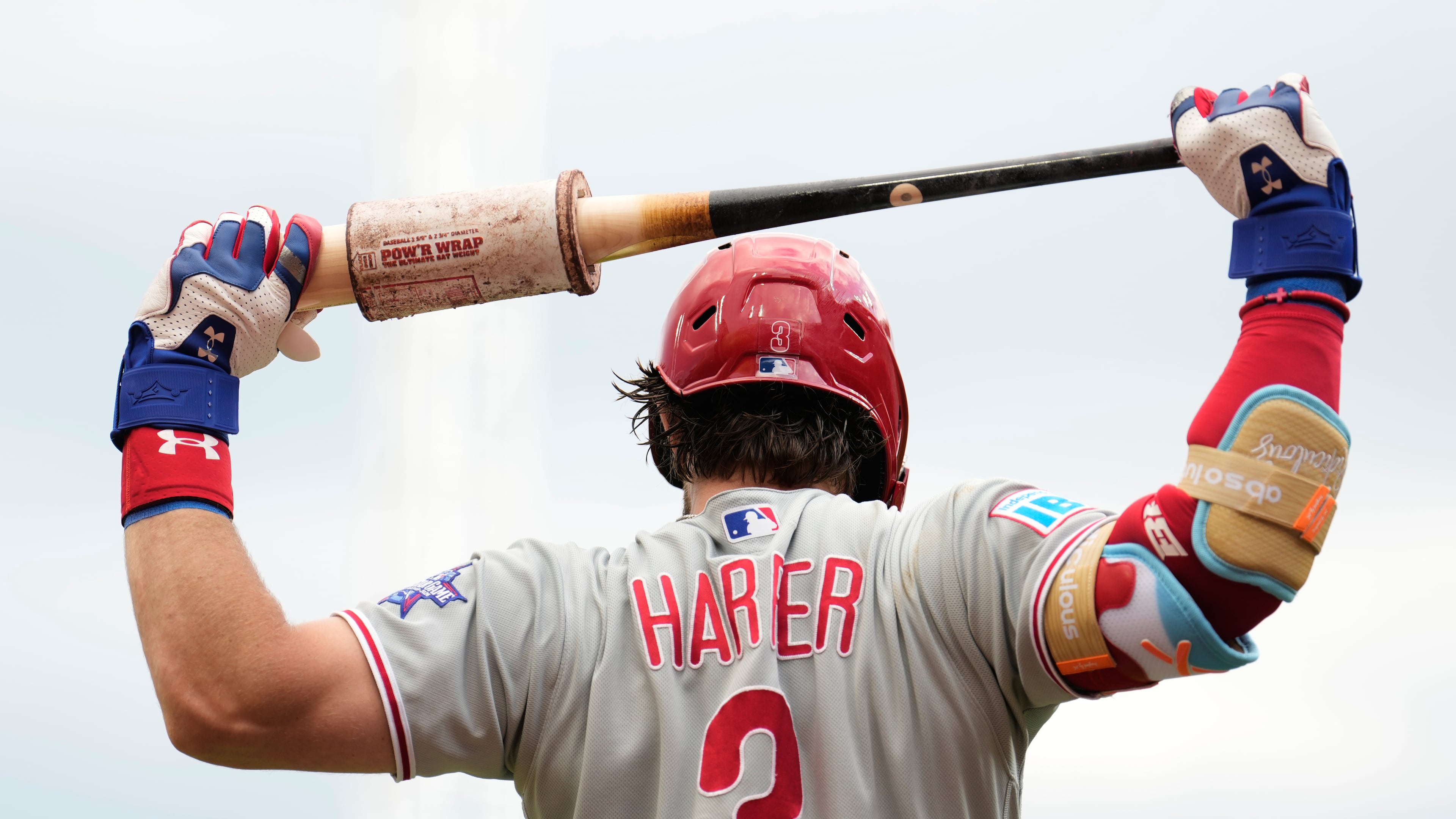 Philadelphia Phillies' Bryce Harper stretches with his bat during the first inning of a baseball game against the Cincinnati Reds in Cincinnati, Tuesday, July 7, 2026. (AP Photo/Carolyn Kaster)
