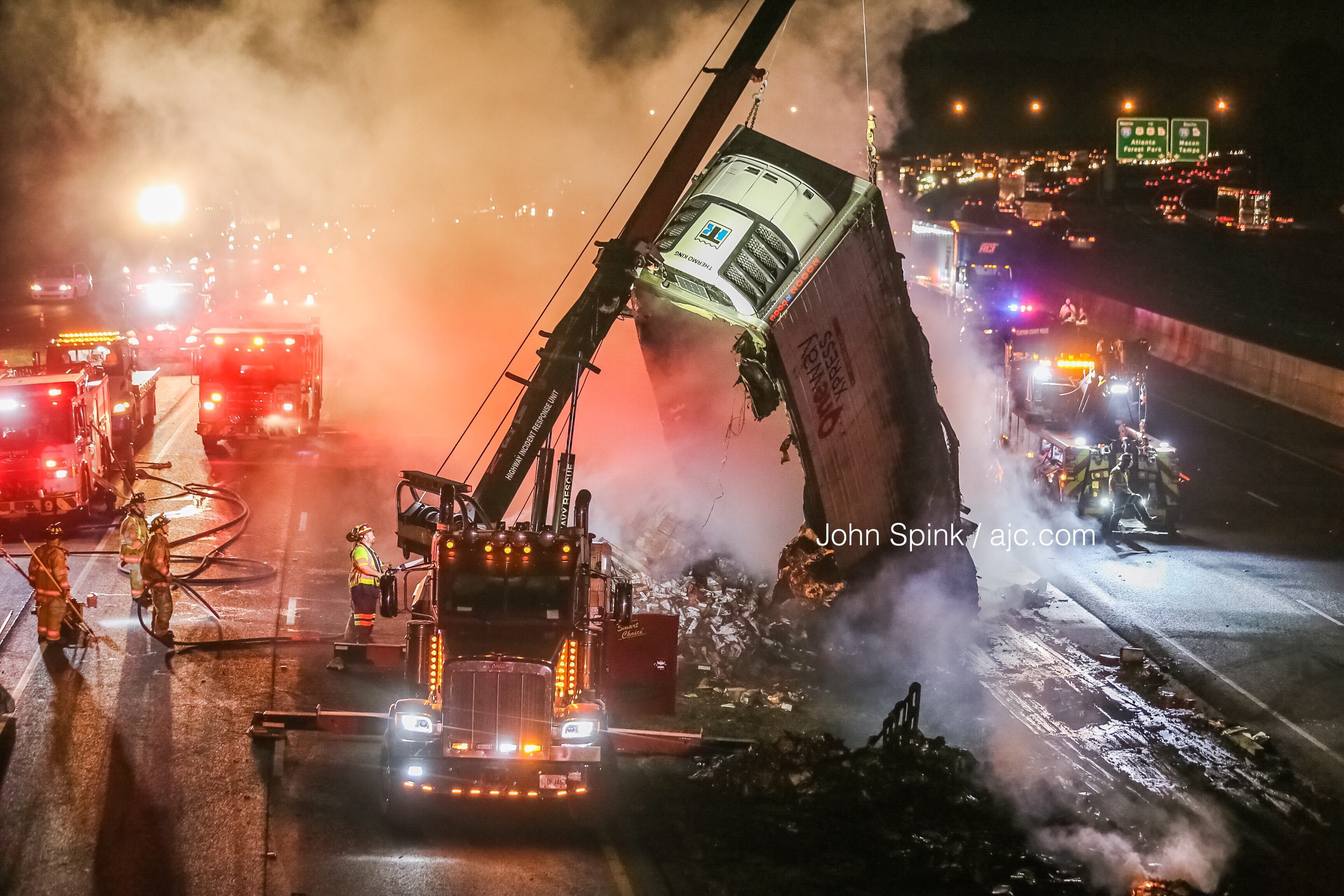Authorities brought in a small crane to aid in firefighting efforts.