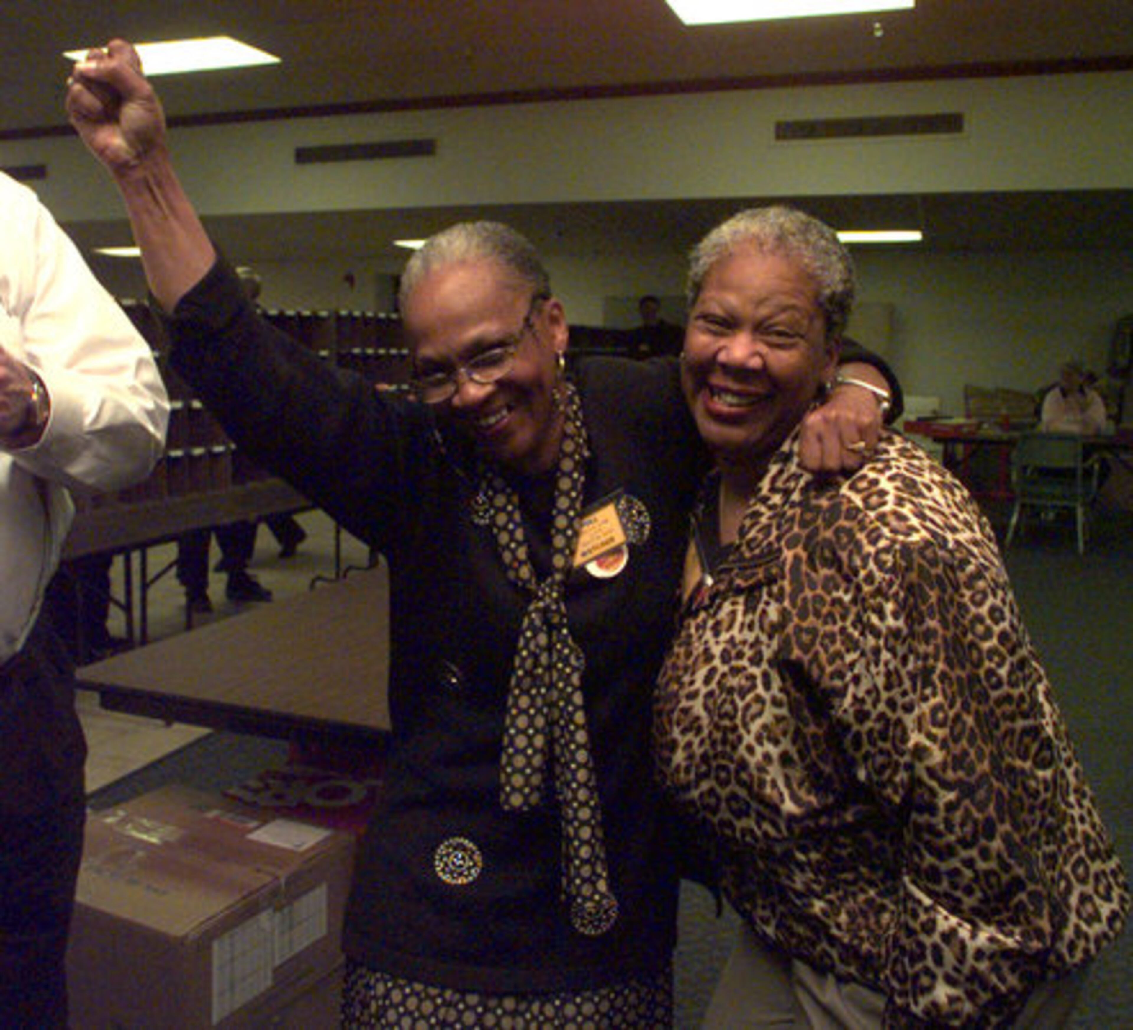 In this Nov. 2,1999 ,photo, Marcia Glenn (left) celebrates with her sister Brenda Woods after winning re-election as mayor of Lithonia. She received 80 percent of the vote.