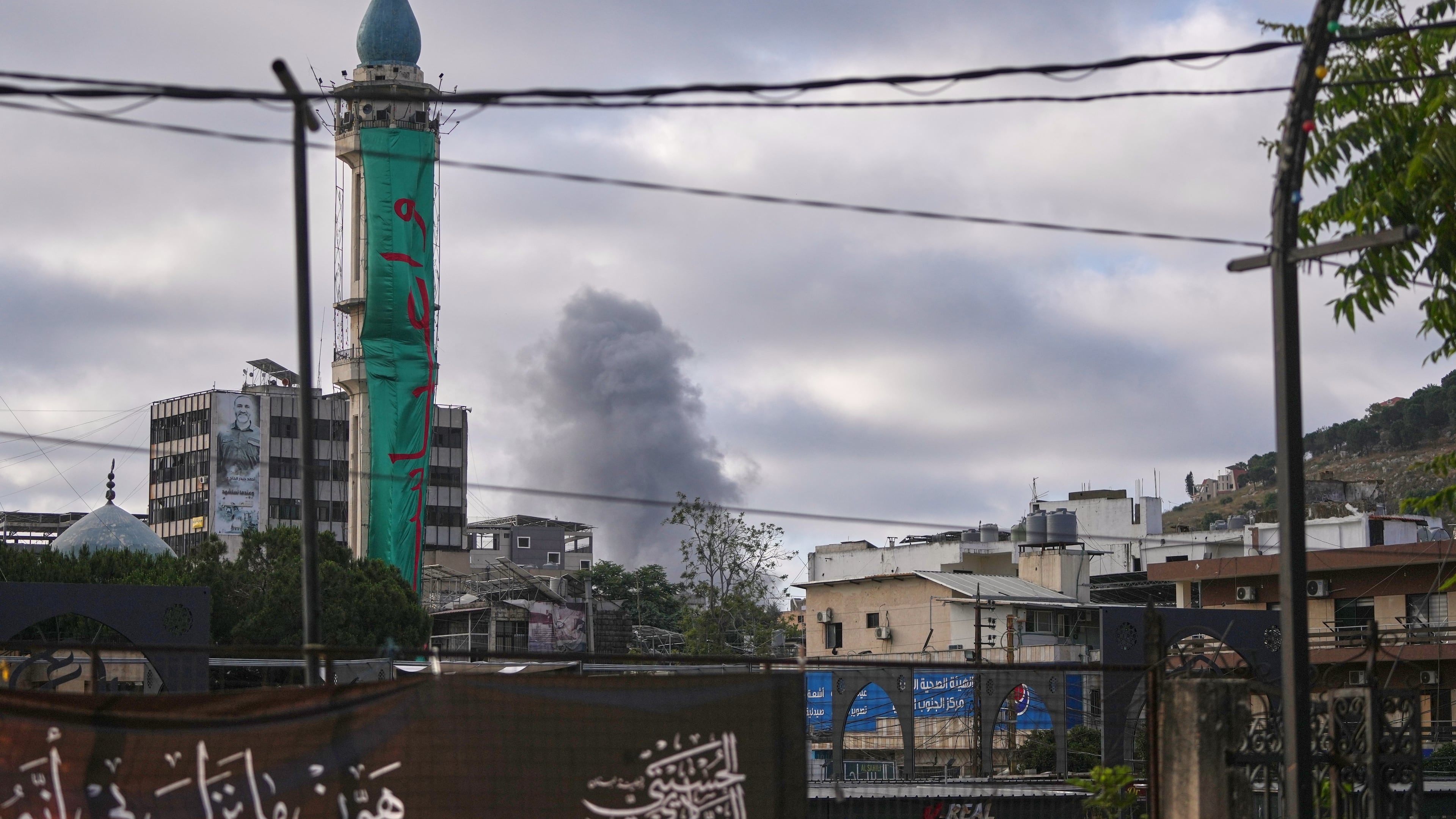 Smoke rises from the site of an Israeli airstrike on the outskirts of Nabatiyeh during Ashoura, when Shiites commemorate the martyrdom of Imam Hussein, the grandson of the Prophet Muhammad, in Nabatiyeh, southern Lebanon, Friday, June 26, 2026. (AP Photo/Hassan Ammar)