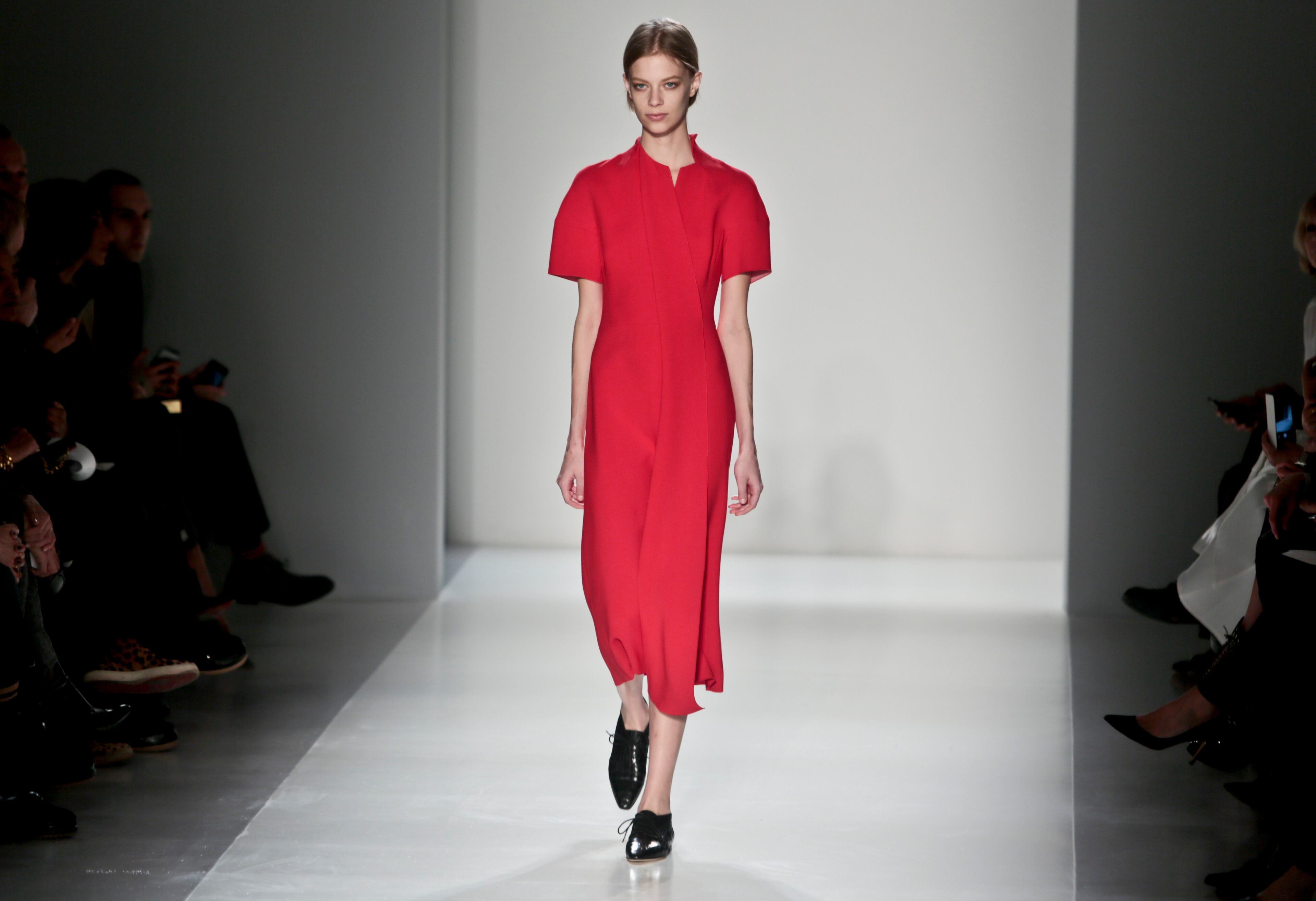 Fashion from the Victoria Beckham Fall 2014 collection is modeled, during New York Fashion Week on Sunday Feb. 9, 2014. (AP Photo/Bebeto Matthews)