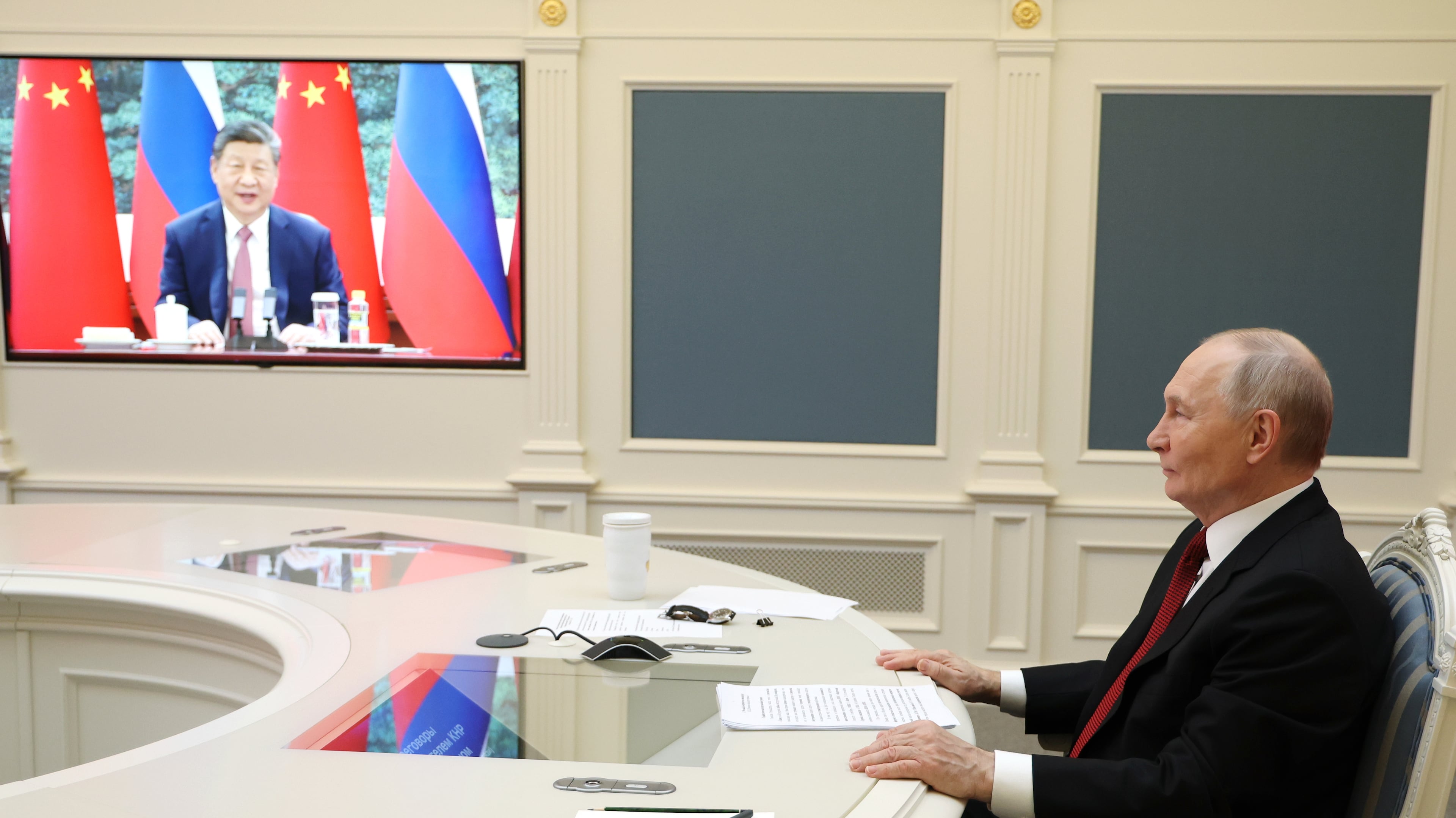 Russian President Vladimir Putin speaks with Chinese President Xi Jinping via videoconference at the Kremlin in Moscow, Wednesday, Feb. 4, 2026. (Vyacheslav Prokofyev/Sputnik, Kremlin Pool Photo via AP)
