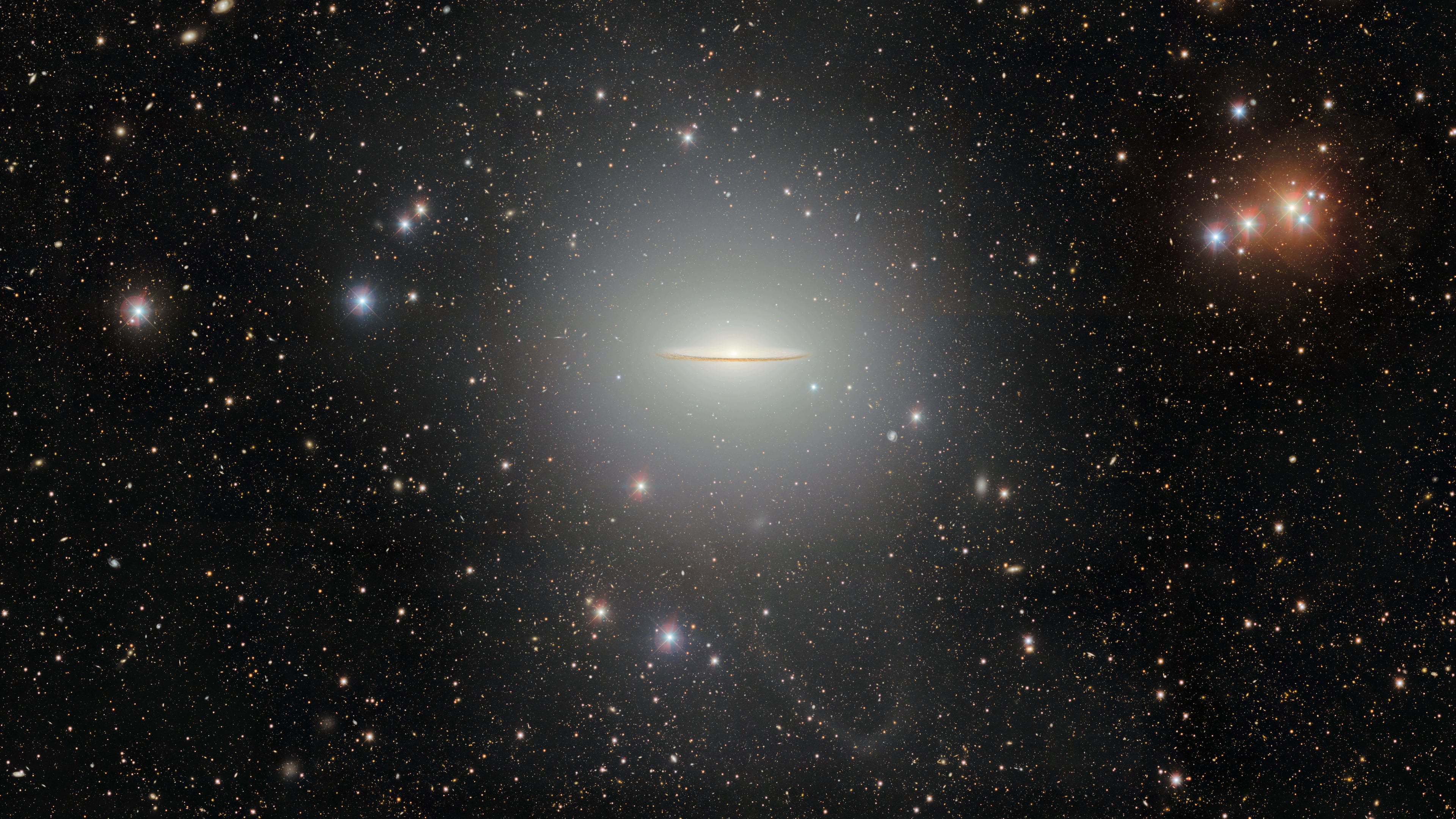 This image provided by the U.S. National Science Foundation’s NOIRLab on Friday, April 24, 2026, shows Messier 104, a spiral galaxy nicknamed the Sombrero galaxy. (NSF NOIRLab via AP)