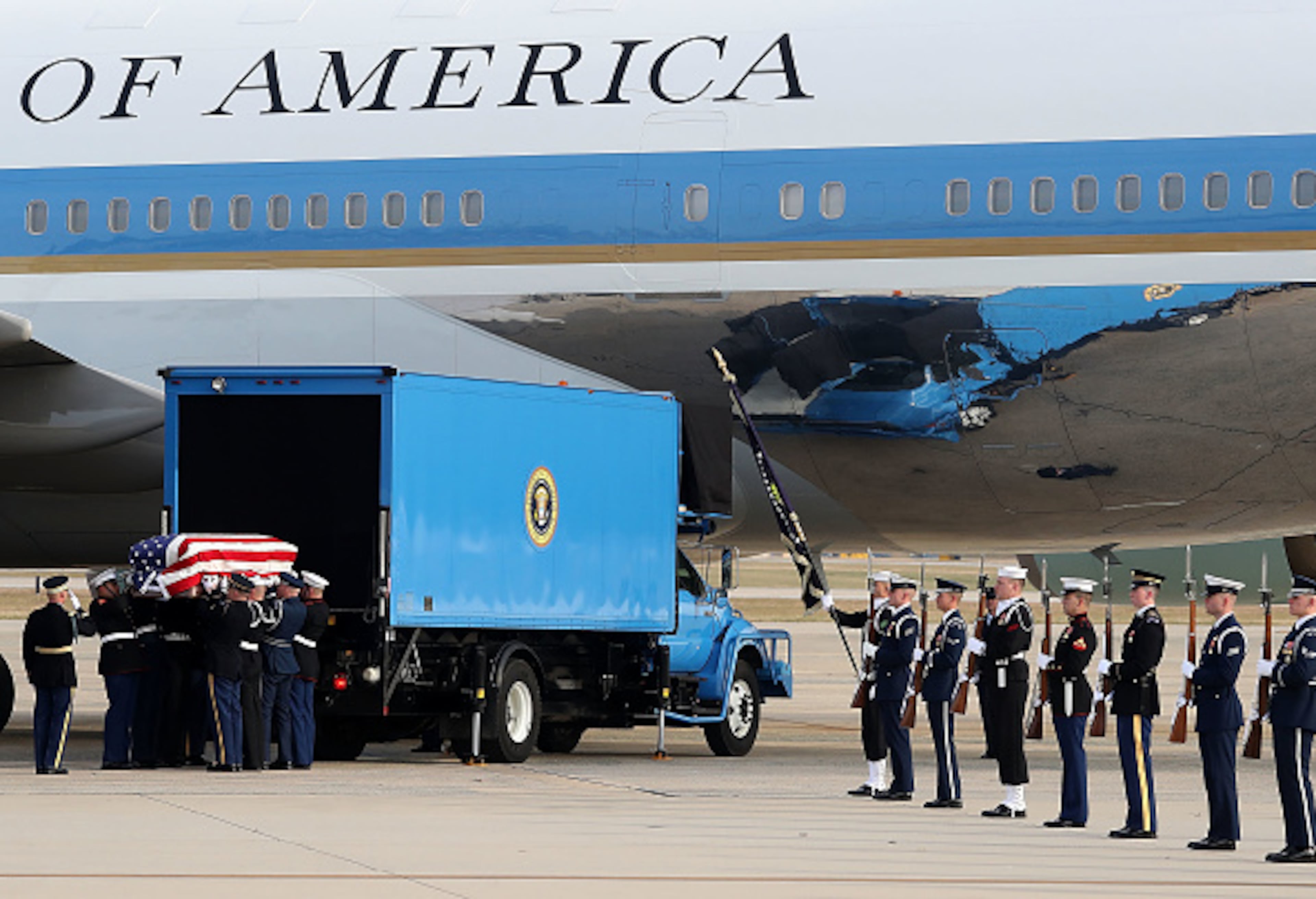 JOINT BASE ANDREWS, MD - DECEMBER 05: A U.S. Military honor guard carries casket of former U.S. President George H.W. Bush before it is loaded onto a U.S. Air Force 747, that is being called 'Special Mission 41', on December 5, 2018 in Joint Base Andrews, Maryland. A state funeral was held for the Nations 41st President before being buried on December 6th at Texas A&M University on the grounds of the George H.W. Bush Presidential Library Center. (Photo by Mark Wilson/Getty Images)