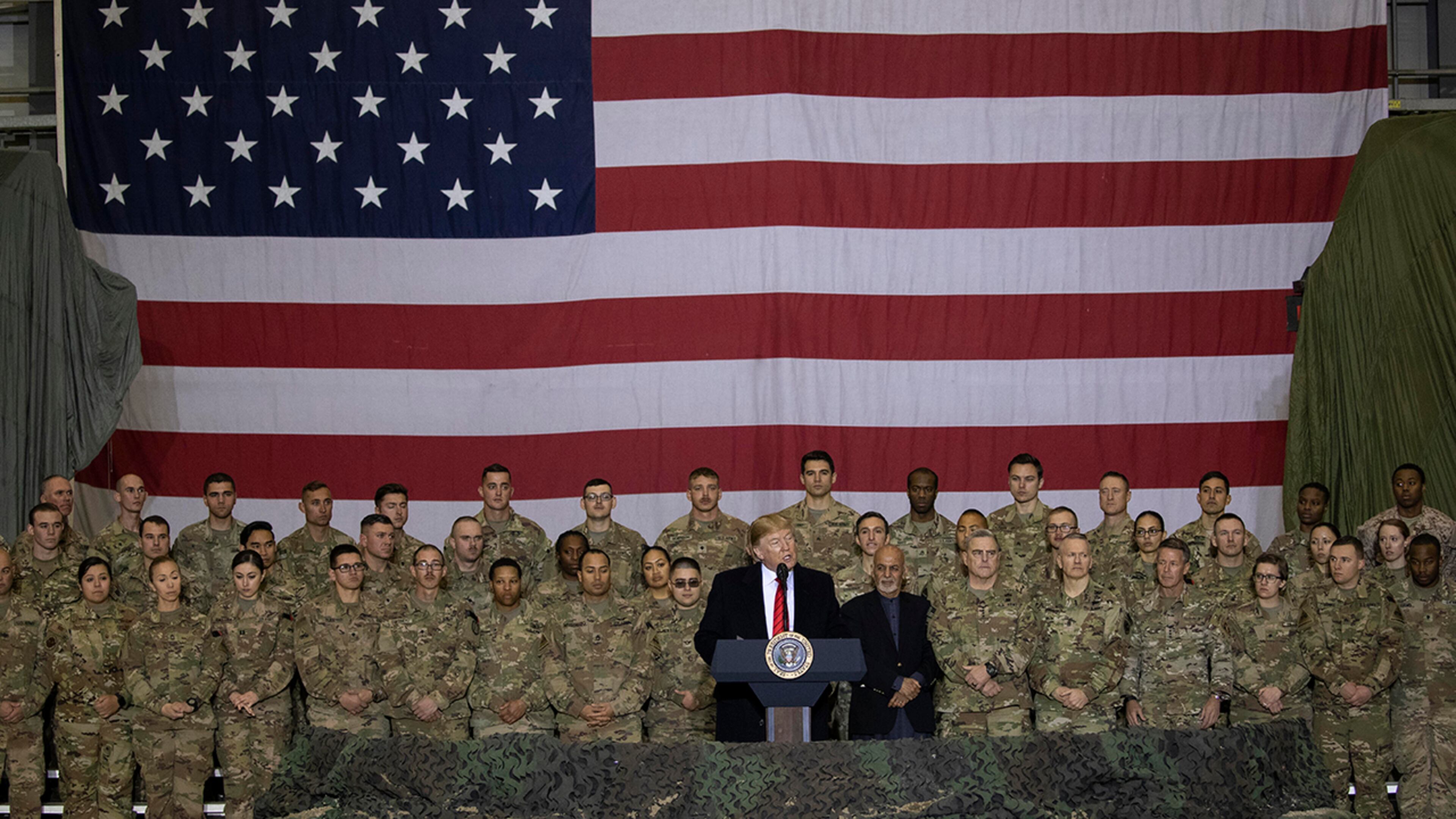 President Donald Trump addresses members of the military during a surprise Thanksgiving Day visit, Thursday, Nov. 28, 2019, at Bagram Air Field, Afghanistan. (AP Photo/Alex Brandon)
