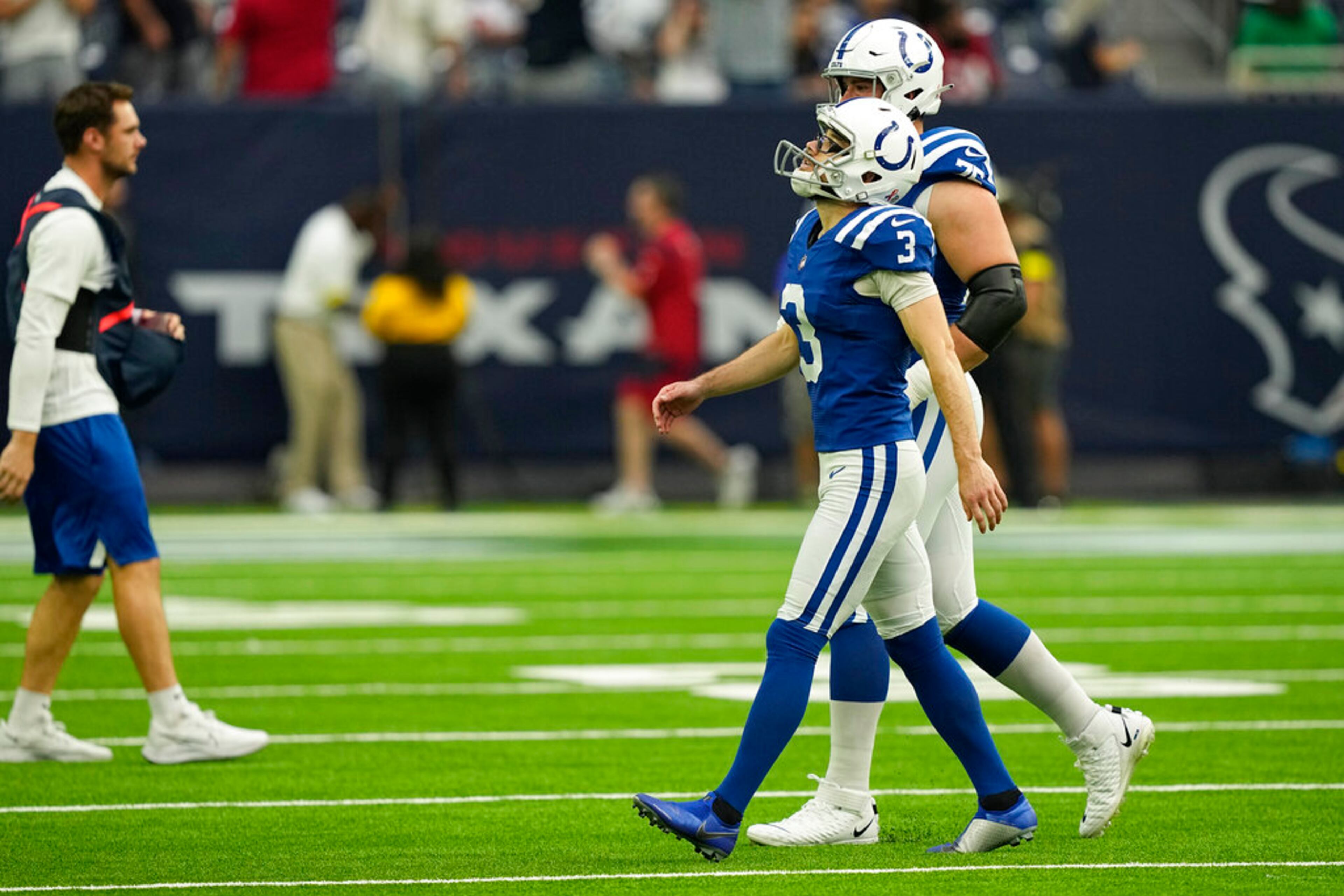 Indianapolis Colts place kicker Rodrigo Blankenship (3) walks off the field after missing a field goal in overtime of an NFL football game Sunday, Sept. 11, 2022, in Houston. (AP Photo/David J. Phillip)