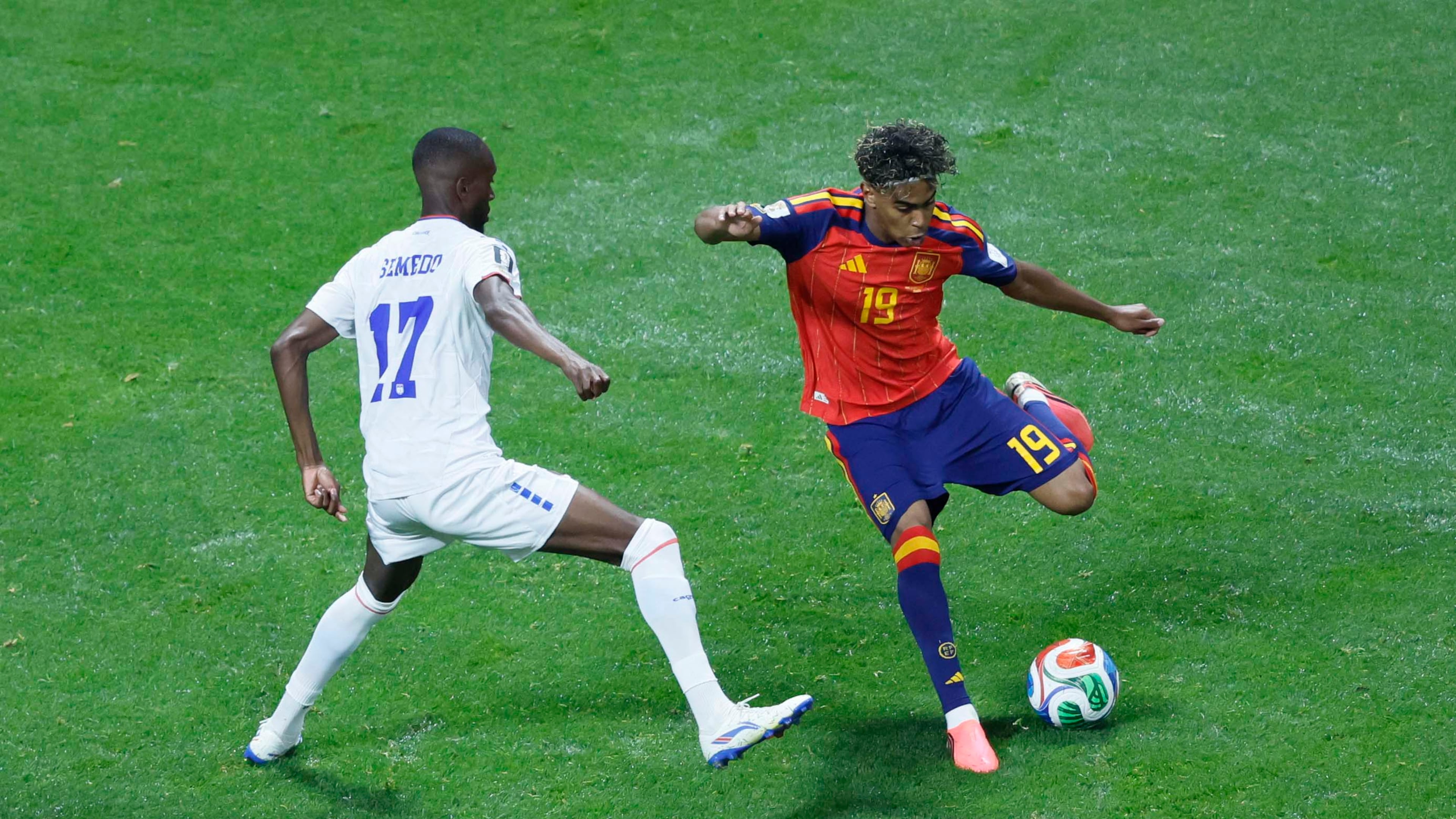 Spain forward Lamine Yamal (right) dribbles under pressure during a World Cup match against Cape Verde on Monday, June 15, 2026, at Atlanta Stadium. (Miguel Martinez/AJC)