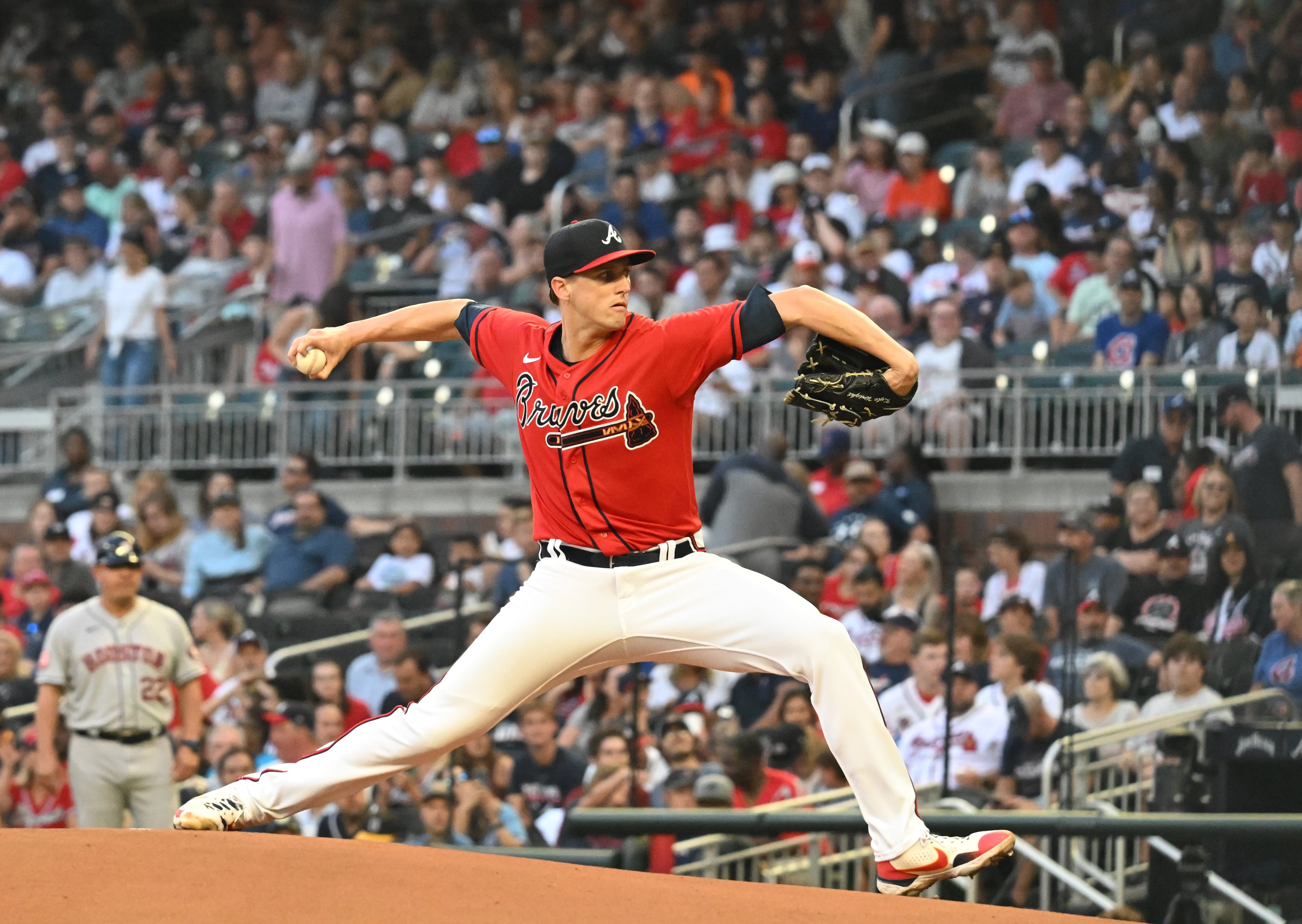 Braves' starting pitcher Kyle Wright (30) throws a pitch in the first inning at Truist Park on Friday, August 19, 2022. (Hyosub Shin / Hyosub.Shin@ajc.com)