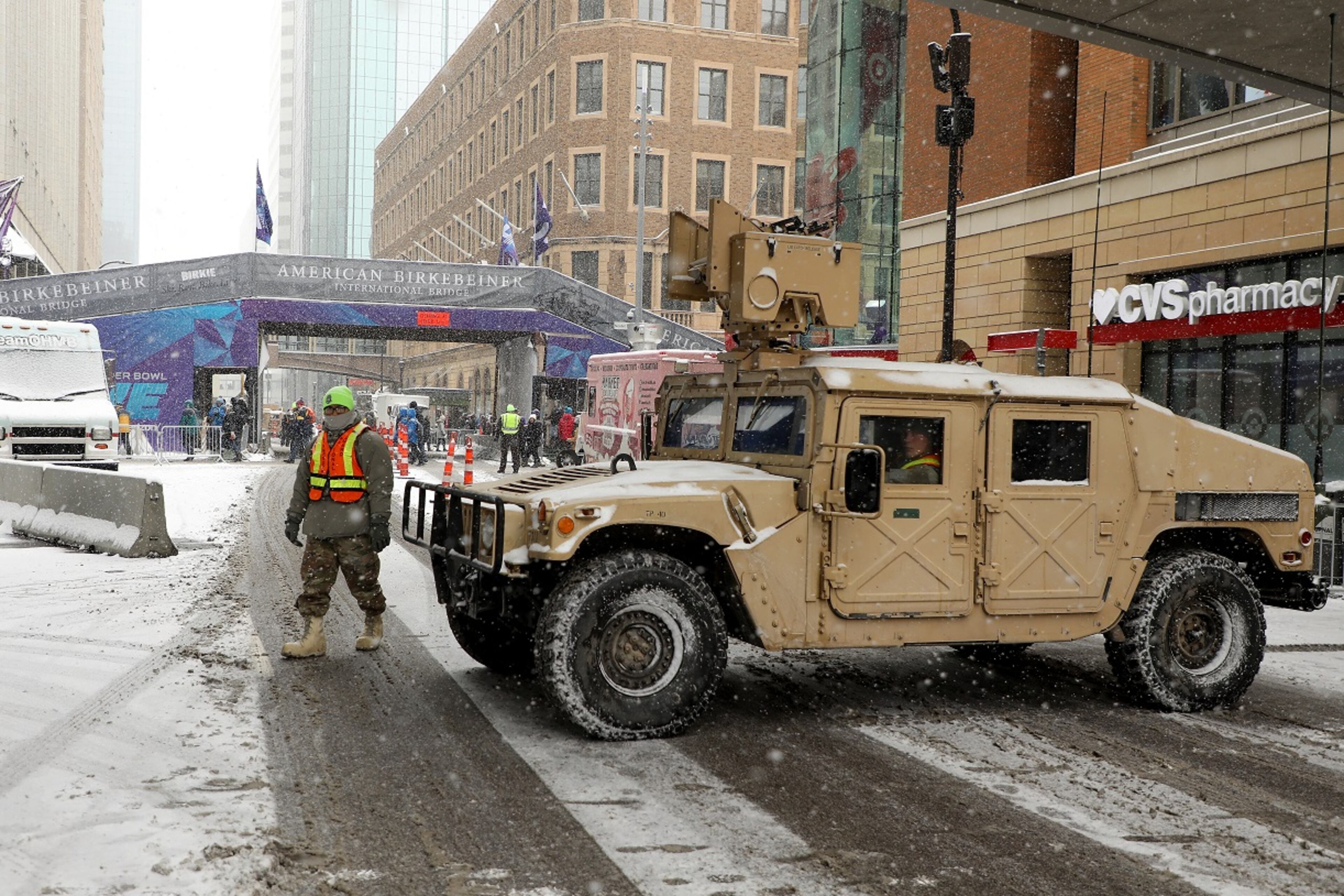 MINNEAPOLIS, MN - FEBRUARY 03: Law enforcement watch over fans as they make their way through the Nicollet Mall during the Super Bowl Live event on February 3, 2018 in Minneapolis, Minnesota. Super Bowl LII will be played at US Bank Stadium on February 4th between the New England Patriots and the Philadelphia Eagles. (Photo by Michael Reaves/Getty Images)