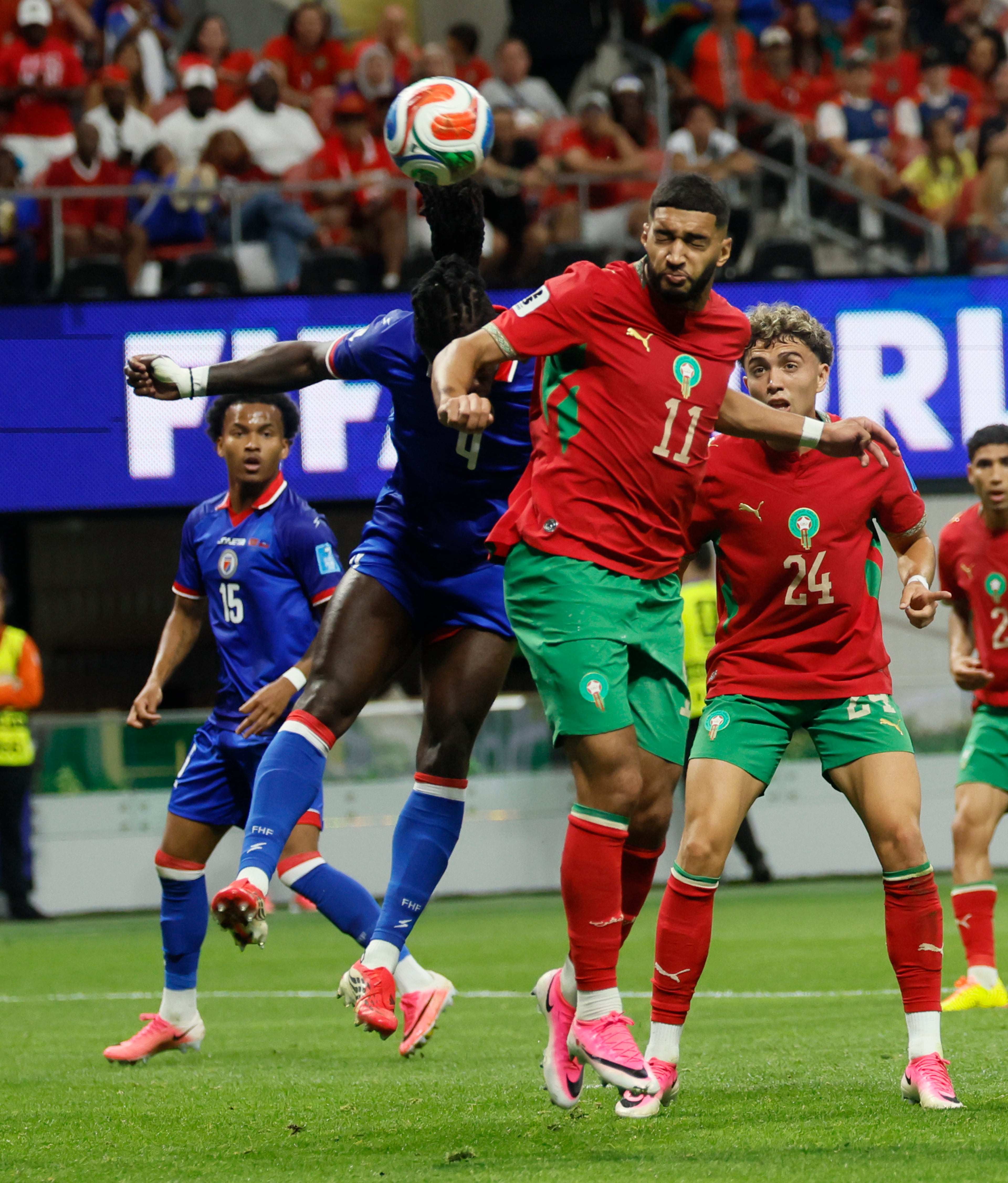 Morocco's Ismael Saibari, center, battles Haiti's Ricardo Ade during first half of Morocco vs. Haiti Group C FIFA World Cup match at Atlanta Stadium (Mercedes-Benz Stadium) on Wednesday, June 24, 2026. (Miguel Martinez/AJC)