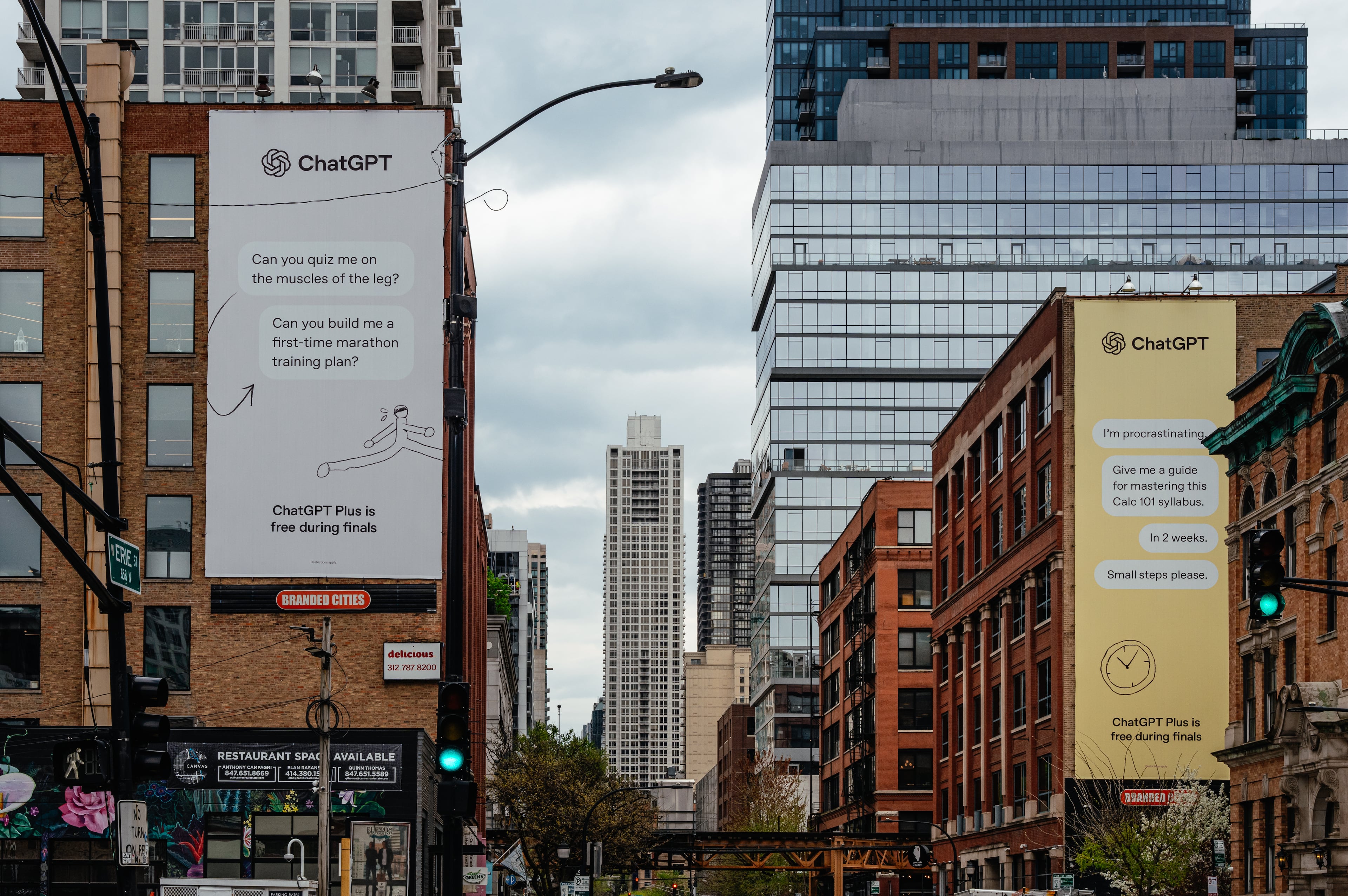 Billboards for ChatGPTÕs ad campaign aimed at college students hang on buildings in ChicagoÕs River North neighborhood on April 23, 2025. (Jamie Kelter Davis/The New York Times)