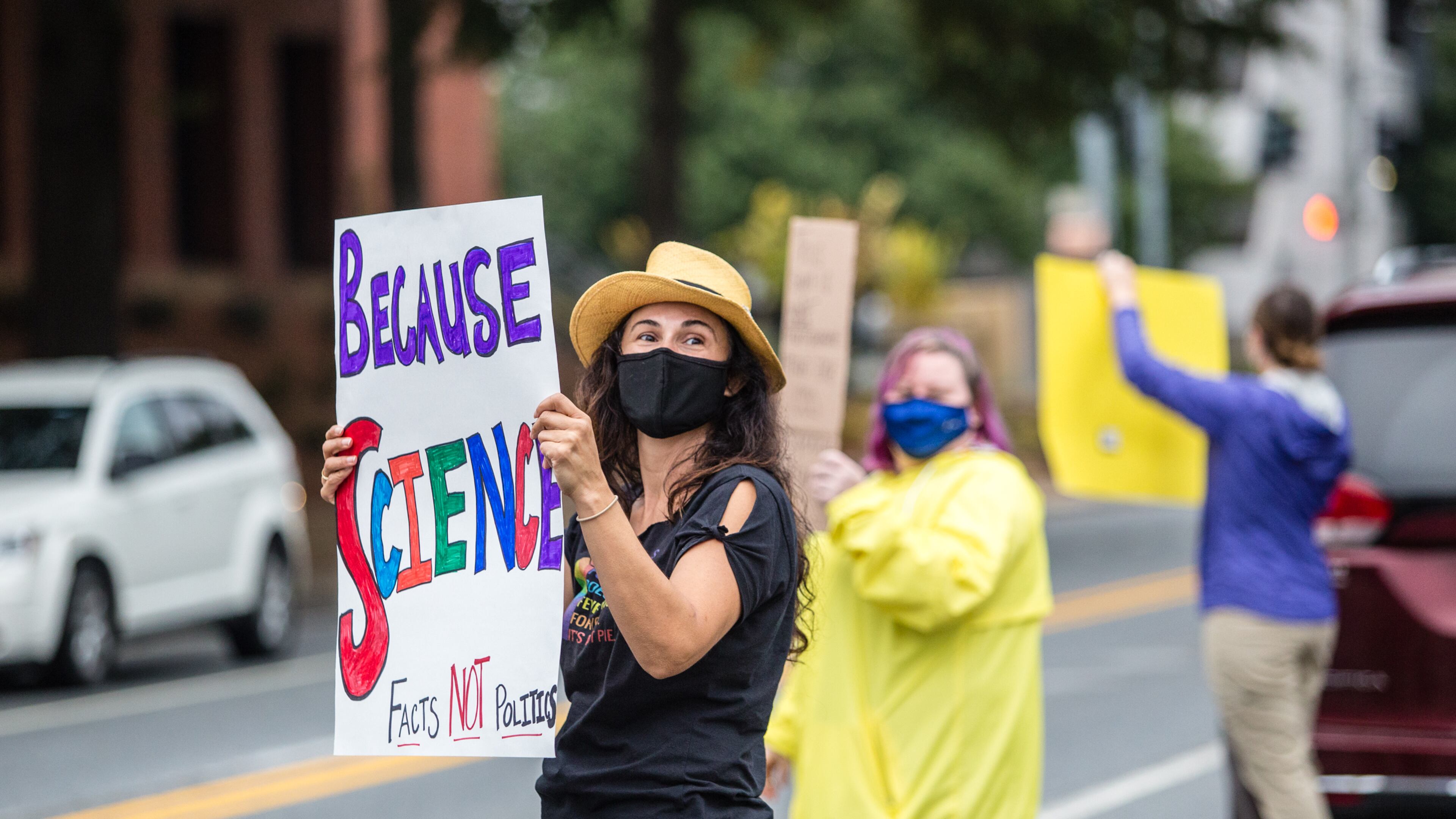 Teachers, parents and students, including Beverly Beyer, a science teacher at Renfroe Middle School with 15 years of experience, protest in front of Decatur City School Headquarters on Trinity Place on Friday, Oct, 9, 2020, in response to the district's plan to return teachers to schools in an effort to get back to in-person learning. (Jenni Girtman for The Atlanta Journal-Constitution)