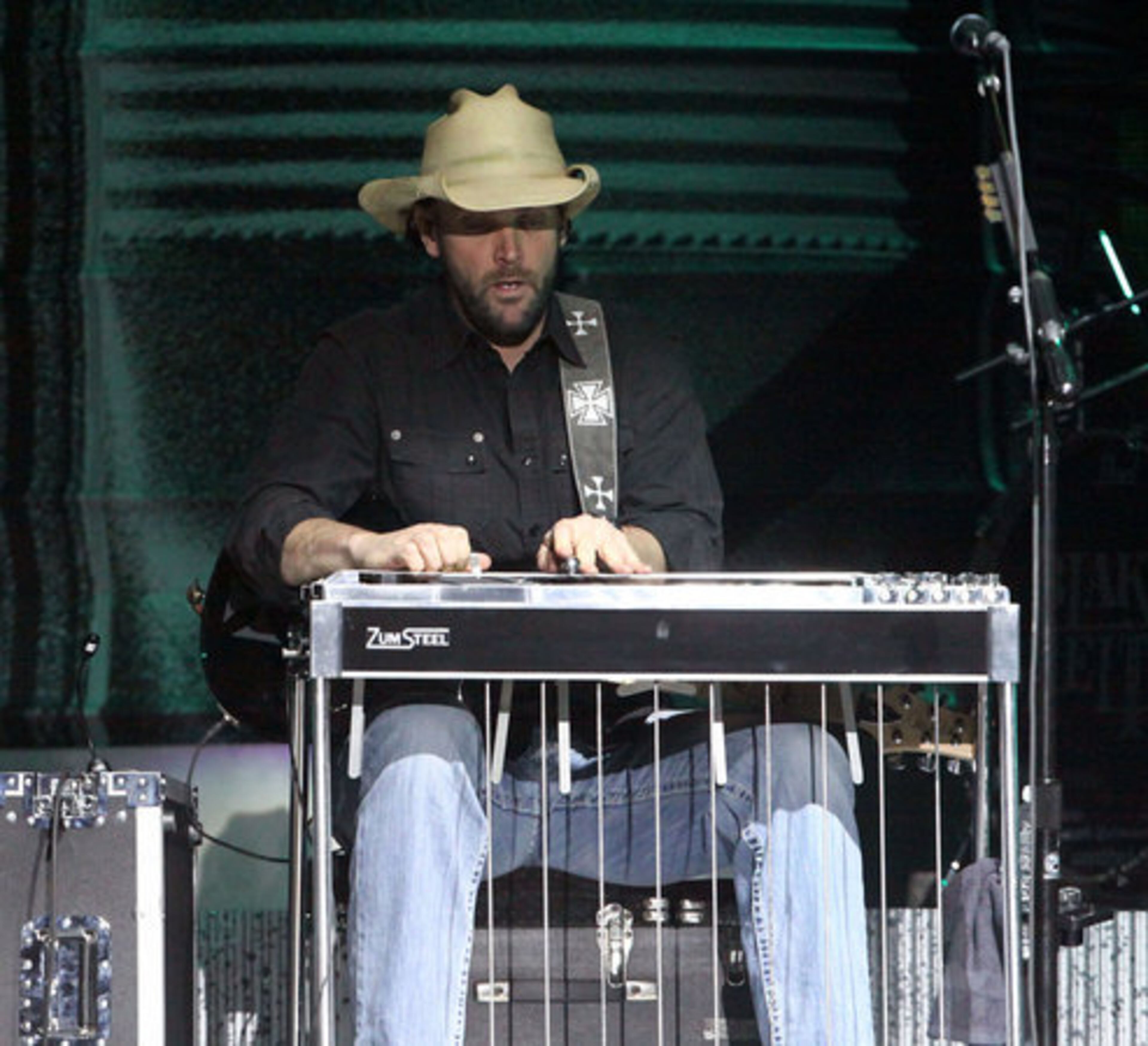Blake Shelton's pedal steel player performs.