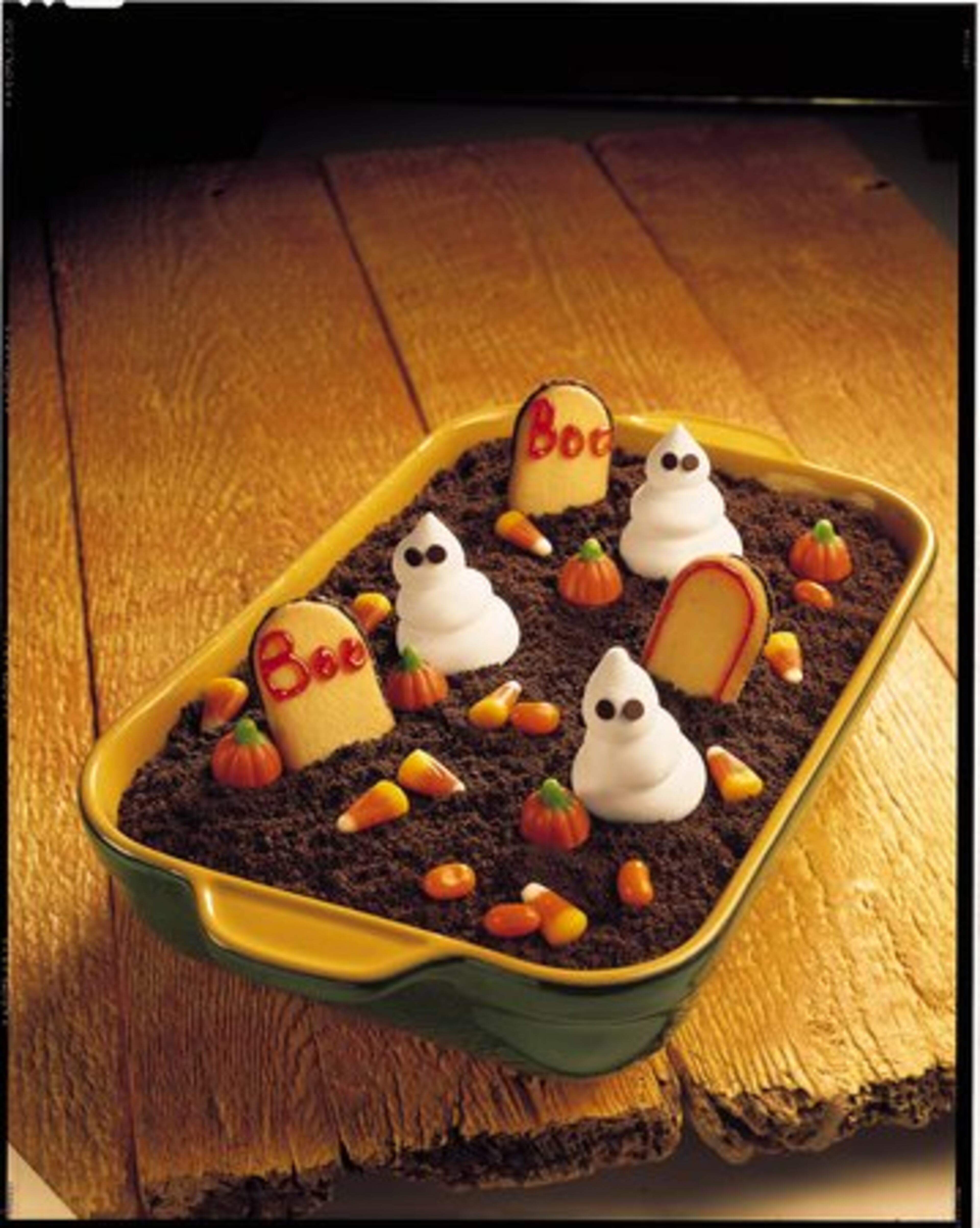 Ghosts rule this sweet graveyard. Chocolate pudding mix is the foundation for this Kraft recipe. Cookies and whipped topping form the tombstones and ghosts. Add candy for "eyes."