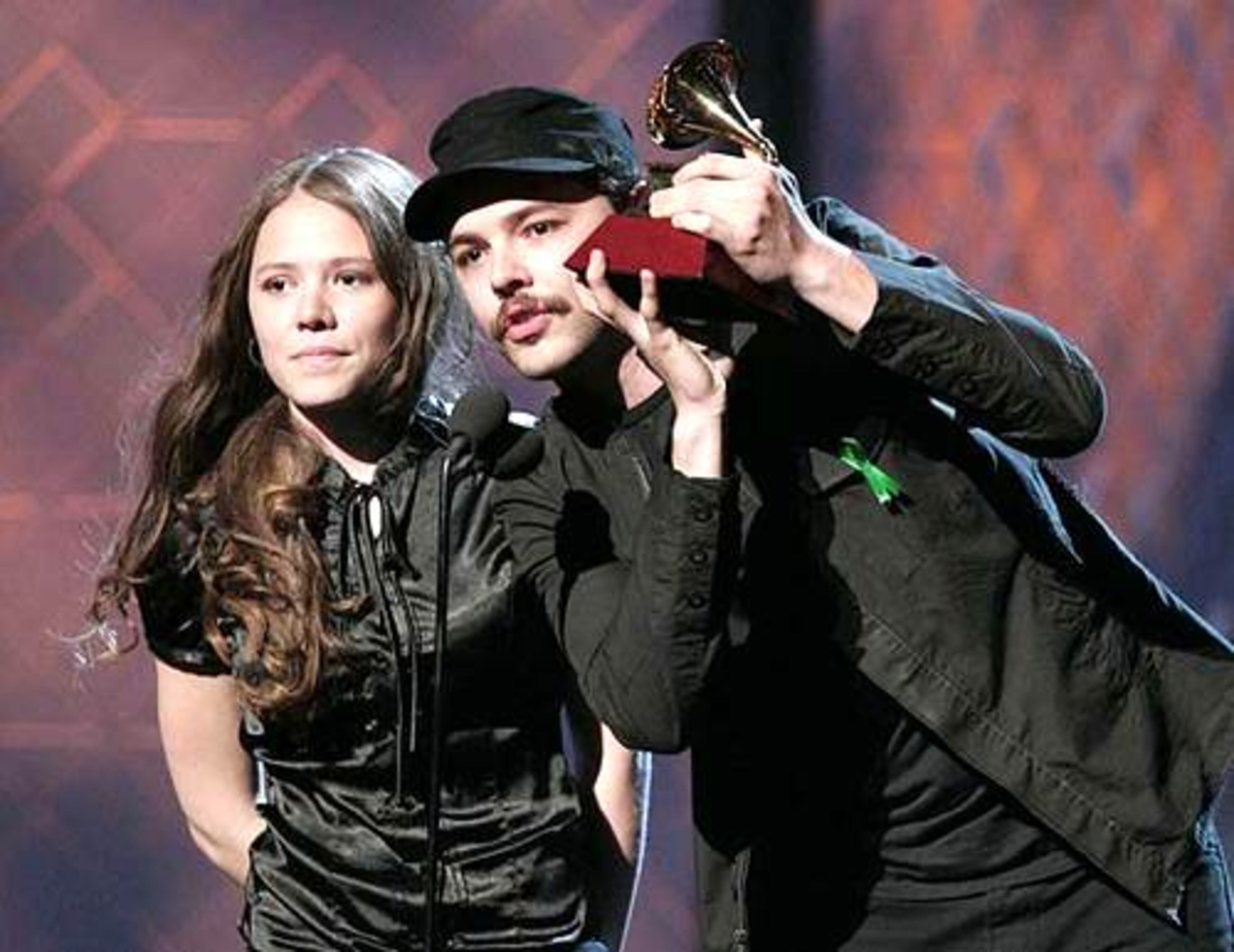 Jesse and Joy accept the award for best new artist at the 8th annual Latin Grammy Awards.