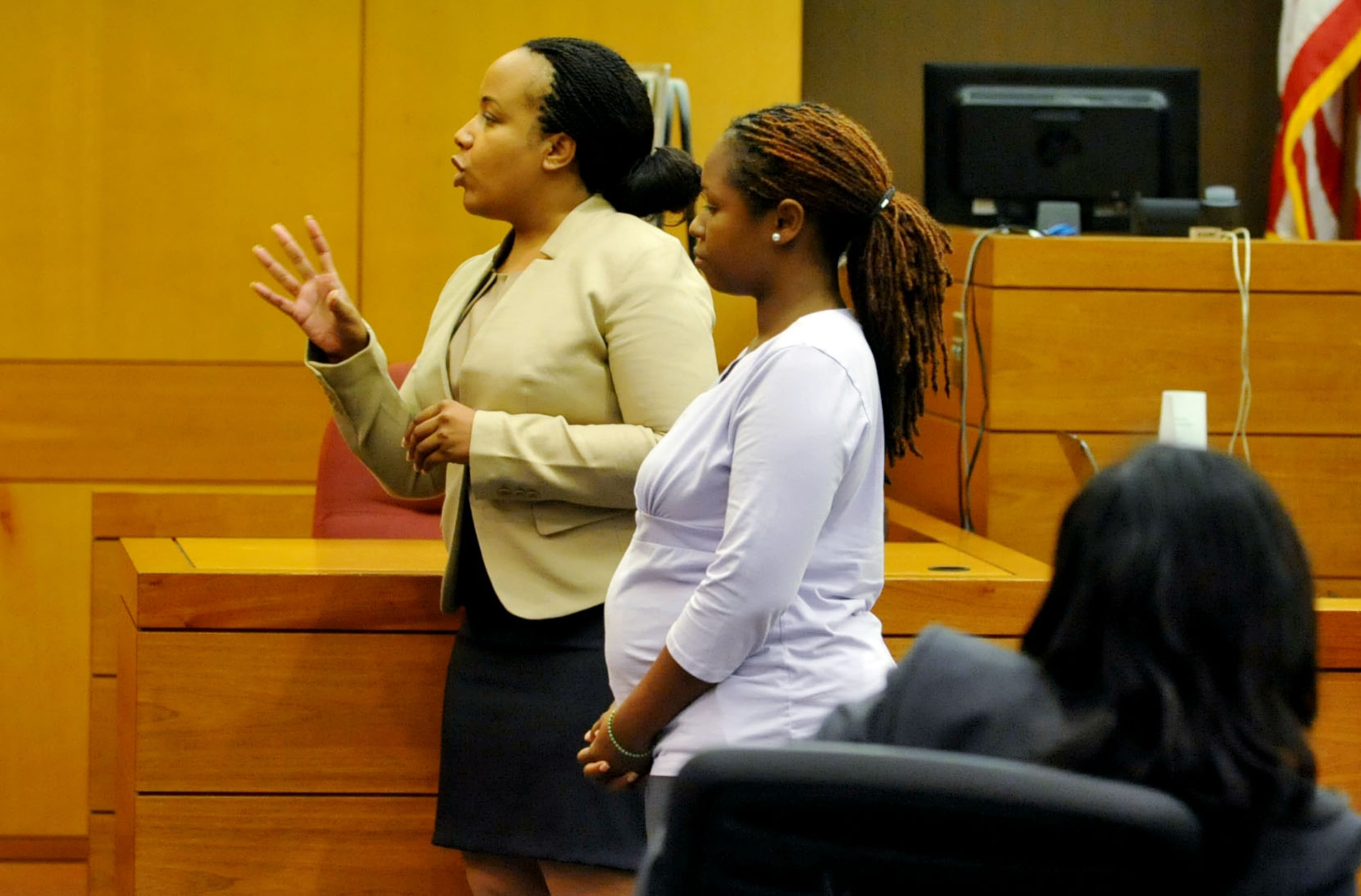 Annette Greene (left), defense attorney for former APS teacher Shani Robinson, makes her opening statement Monday afternoon.KENT D. JOHNSON / KDJOHNSON@AJC.COM