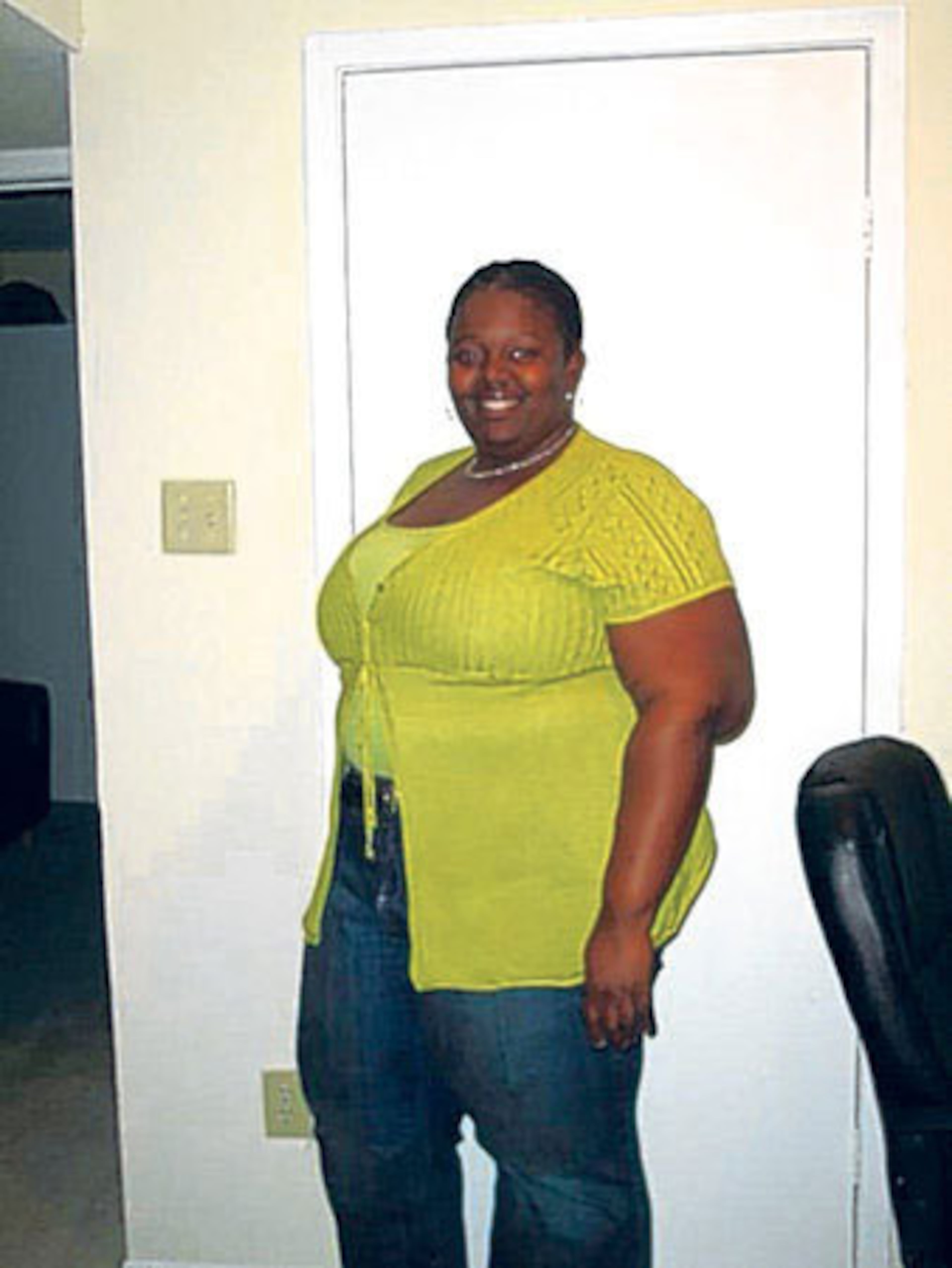 Kendra K. Daniel is shown here at 375 pounds in November 2007. After a friend motivated her, she started going to the gym and using the tools on SparkPeople.com to keep track of the calories she consumed.