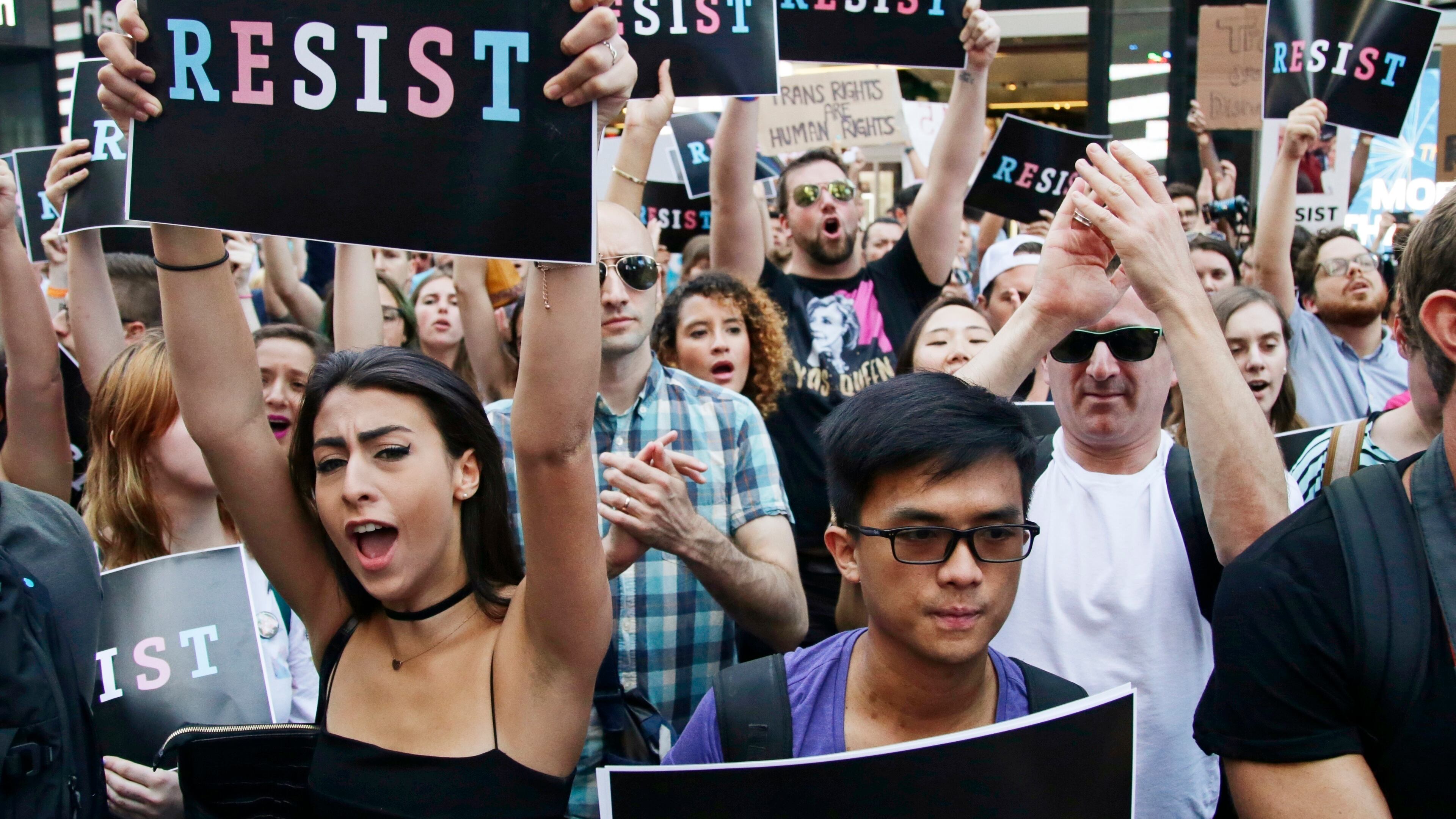 July 26, 2017: Protesters rally in New York City to protest President Donald Trump’s announcement of a ban on transgender troops serving anywhere in the U.S. military. (AP Photo/Frank Franklin II, File)