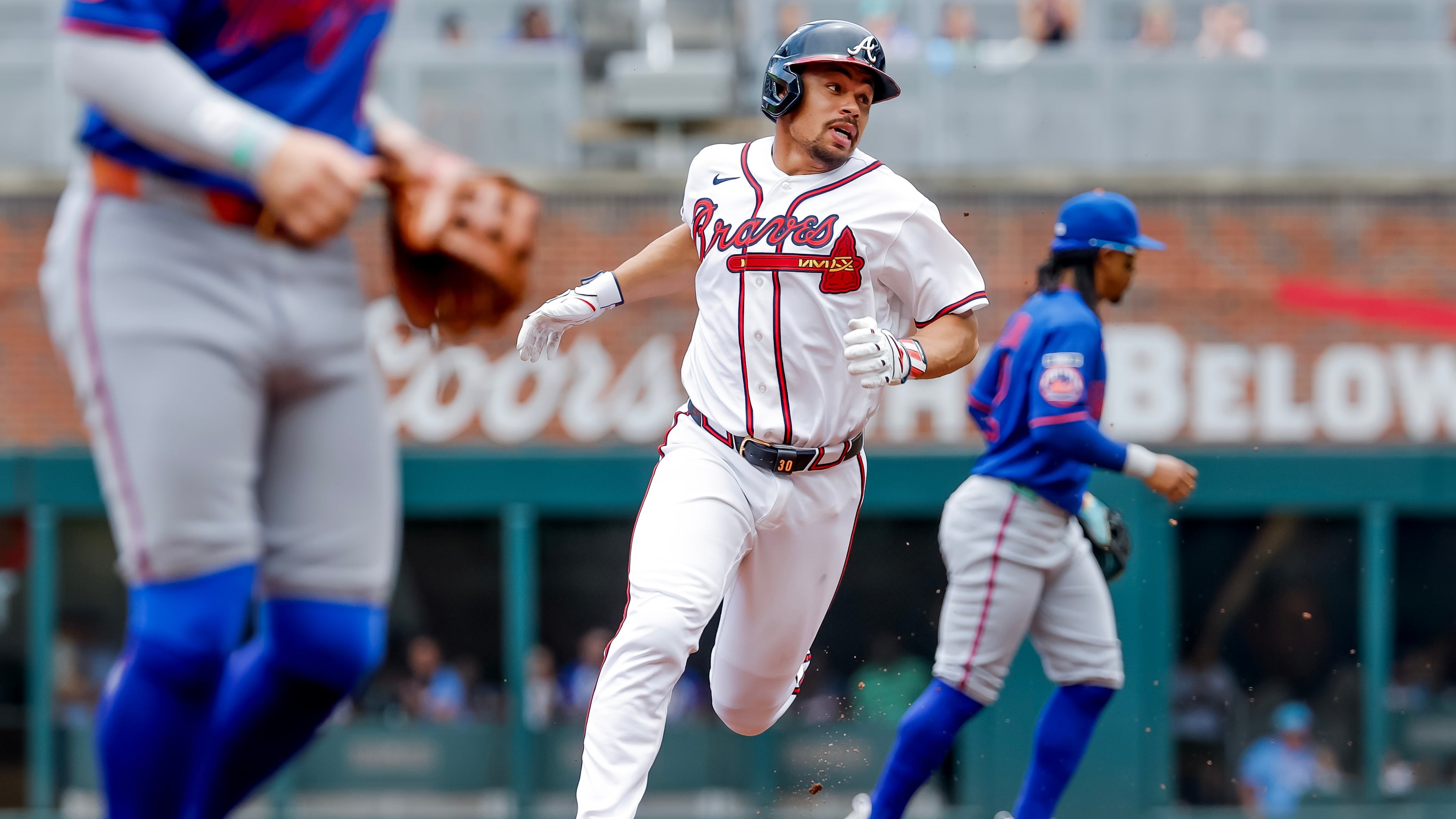 The Braves' Drake Baldwin (center) advances from first base to third during the first inning against the Mets on Sunday, July 5, 2026, in Atlanta. (Erik S. Lesser/AP)