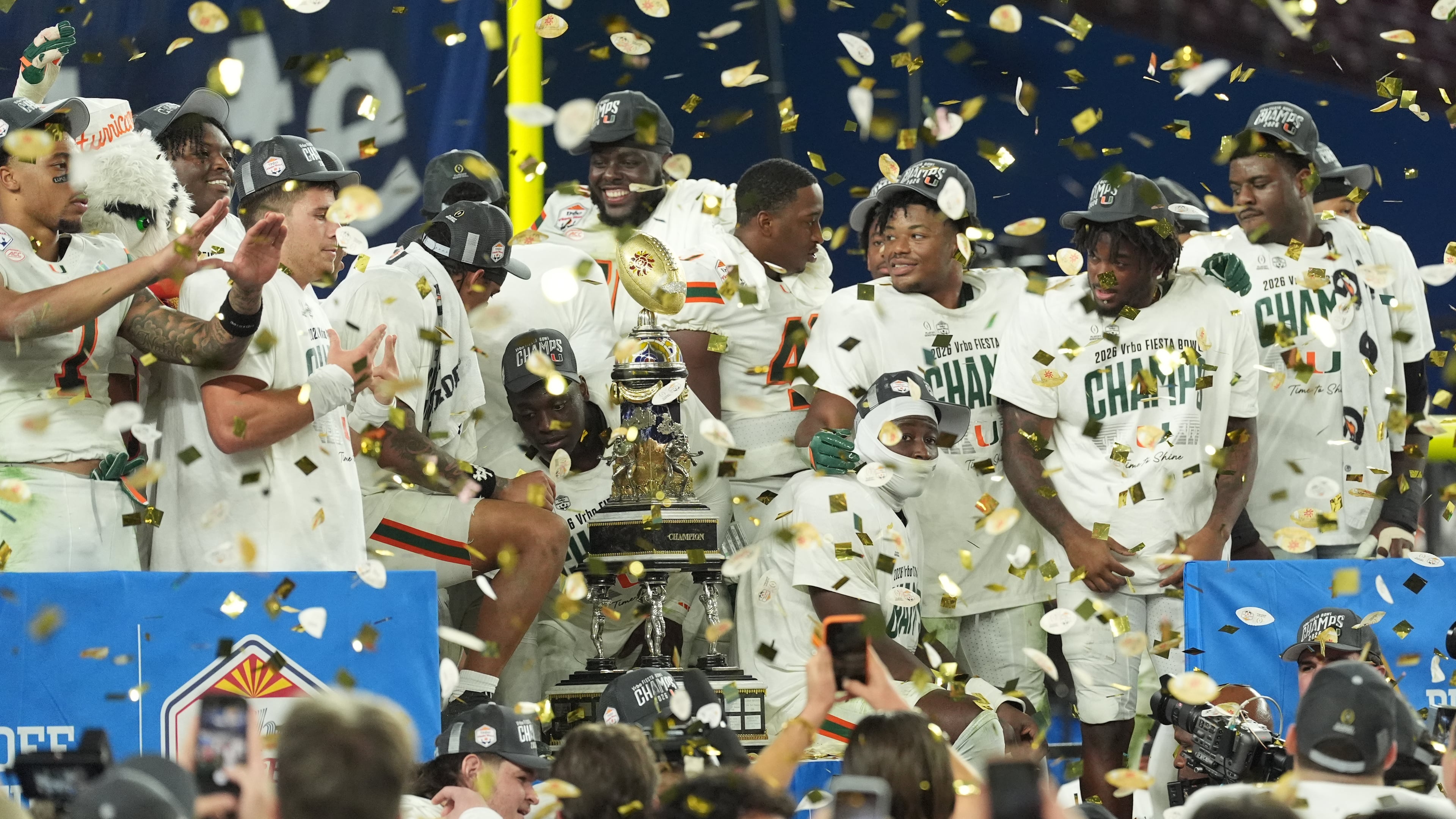 Miami players celebrate after beating Ole Miss — the last SEC team in the College Football Playoff bracket — in the Fiesta Bowl CFP semifinal game on Thursday, Jan. 8, 2026, in Glendale, Ariz. (Ross D. Franklin/AP)