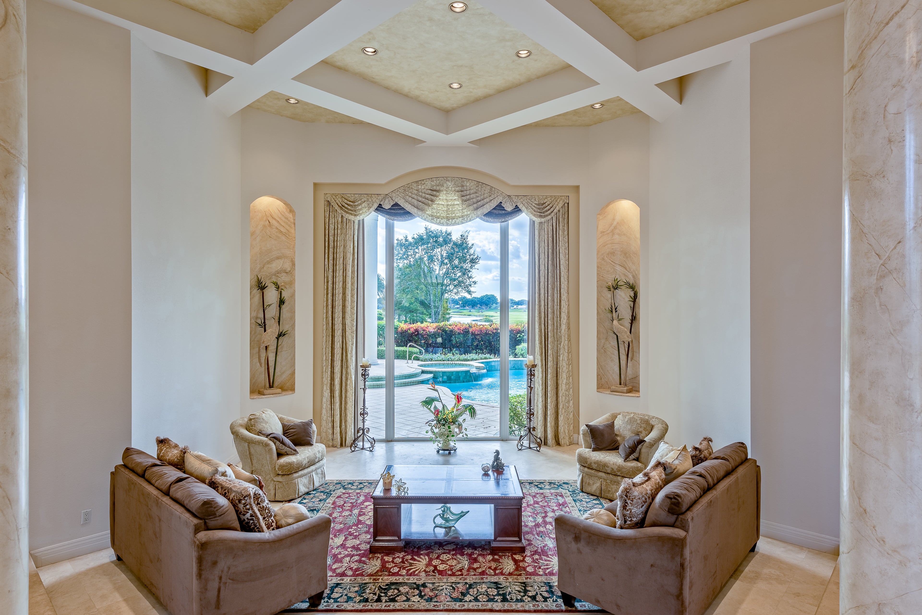 Former GOP residential hopeful and the future HUD secretary Ben Carson has listed his golf-club community home in Palm Beach, Fla. for $1.2 million. The two-story residence has soaring floor-to-ceiling windows that wonderfully blend the the outside tropical paradise with the interior living spaces. This five bedroom, 6000 ft., and 4.5 bathroom is a mini-mansion that comes with marble floors, custom built-in's throughout, remote operated window coverings along with a tastefully upgraded chefs kitchen. (Listing courtesy ENGEL & VOLKERS Palm Beach)