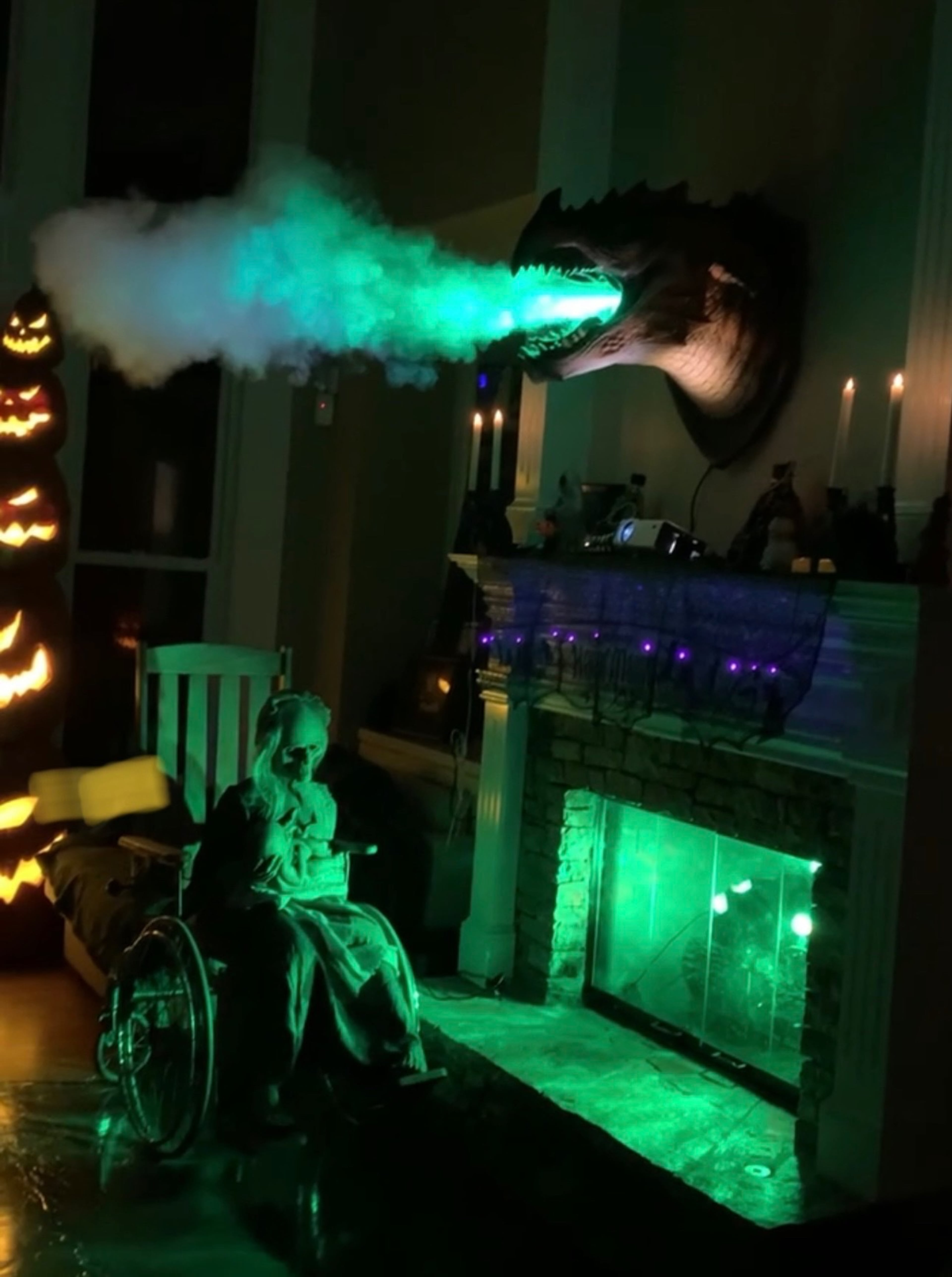 A mounted beast blows smoke to add to the spooky atmosphere in the Cabrera’s rear living room. The family estimates they’ve invested around $100,000 in the haunted house over the past 14 years. (Courtesy of the Cabrera Family Haunted House)