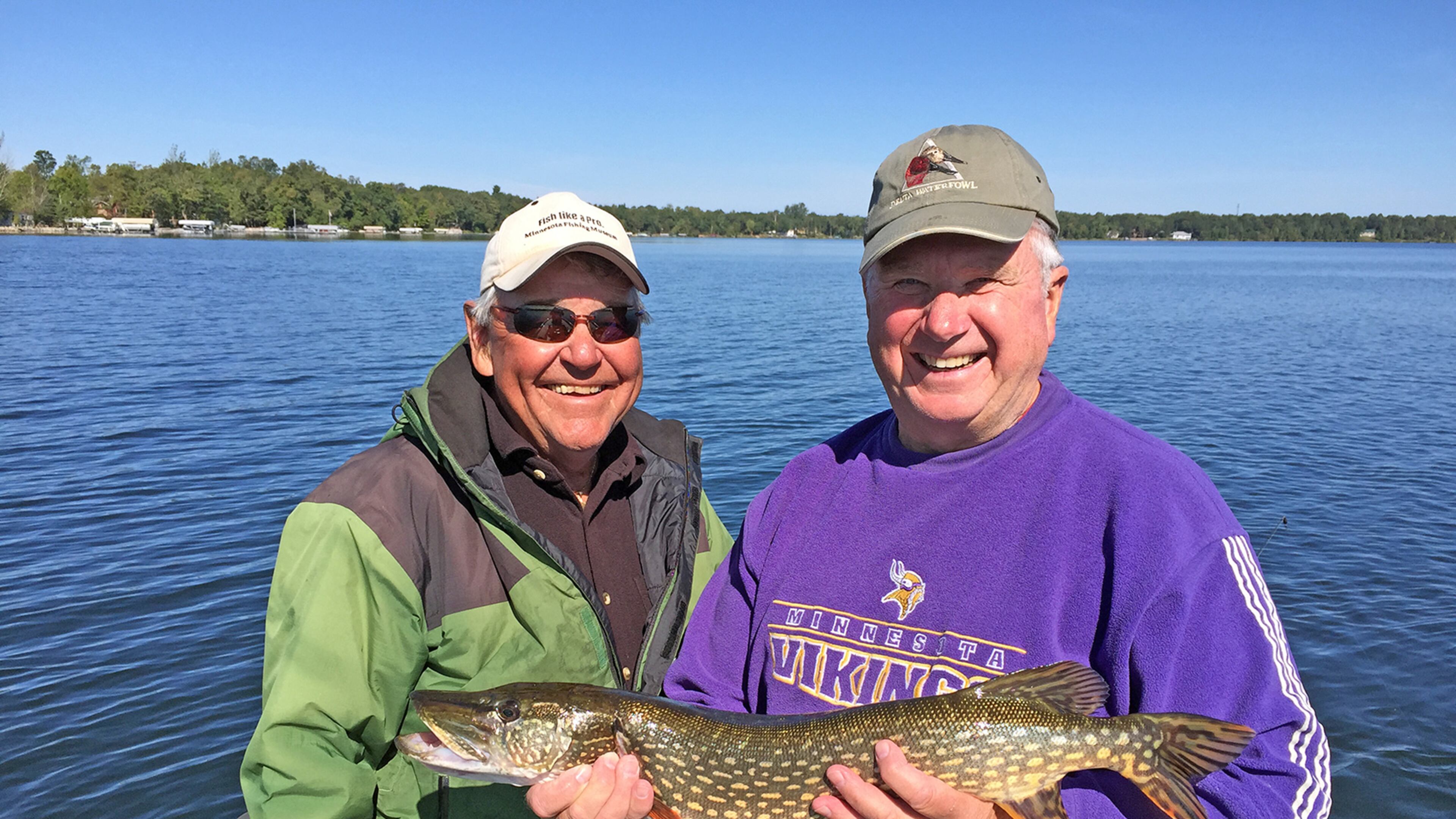 Longtime Brainerd-Nisswa area fishing guide Marv Koep, left, with Fr. Mike Arms, a regular walleye-angliing partner and retired Catholic priest who moved from the Twin Cities to Crosslake and now lives in a lake cabin that has been in his family for 80 years. (Dennis Anderson/Minneapolis Star Tribune/TNS)