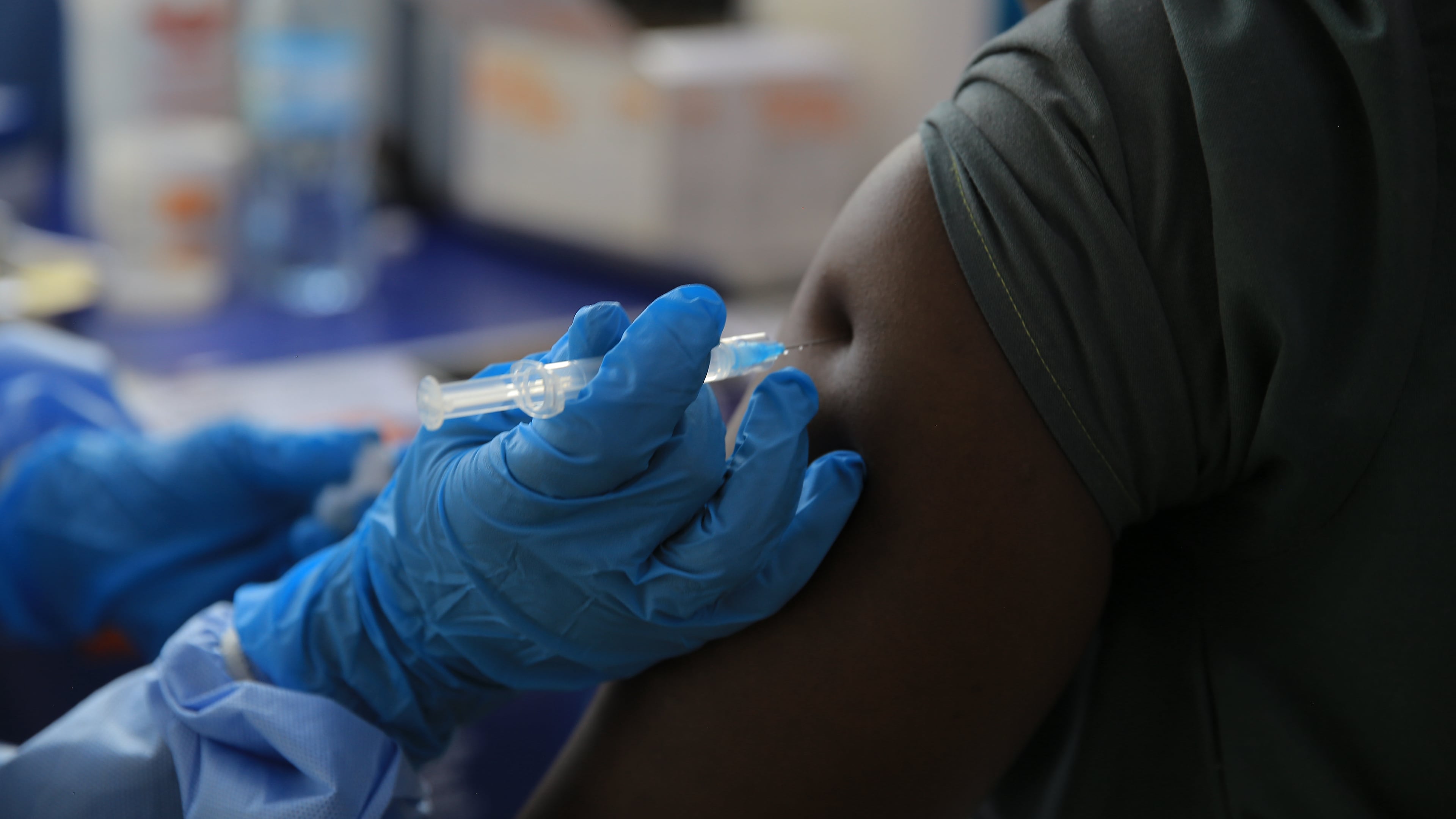 A health care worker administers a dose of Ervebo vaccine against the Ebola virus in Beni, North Kivu province, eastern Congo, Friday, Oct. 16, 2026. (AP Photo/Sebastien Kitsa Musayi)