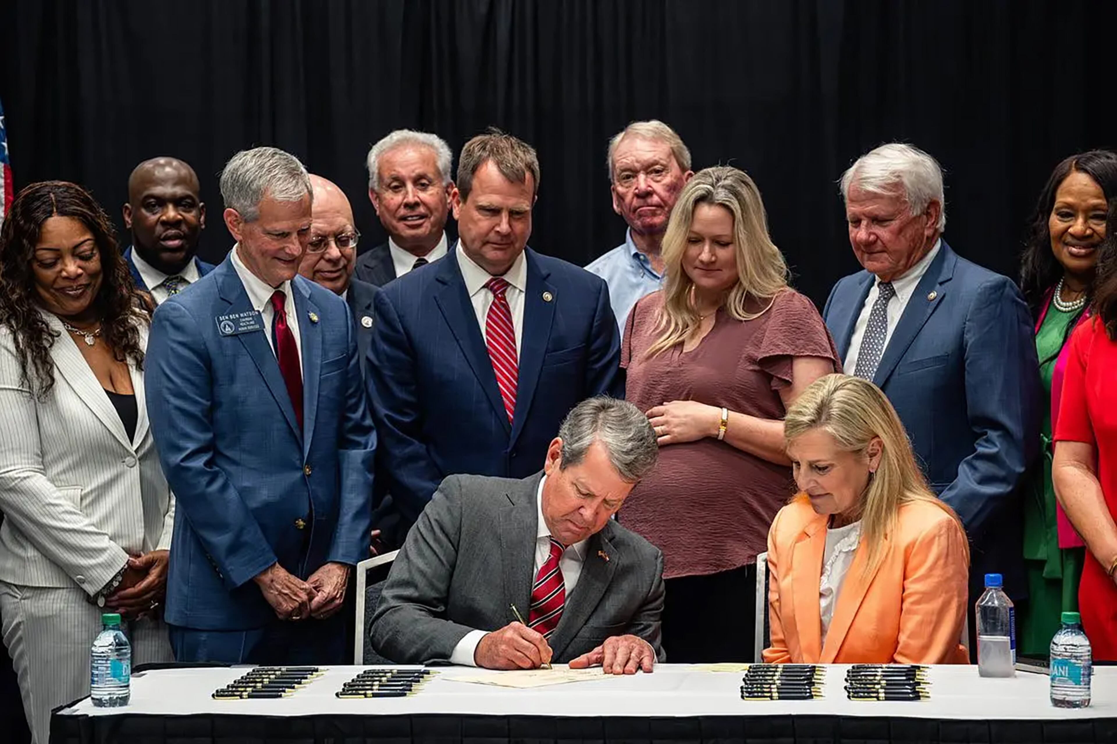 Gov. Brian Kemp signed a bill at the Savannah Convention Center earlier this month.