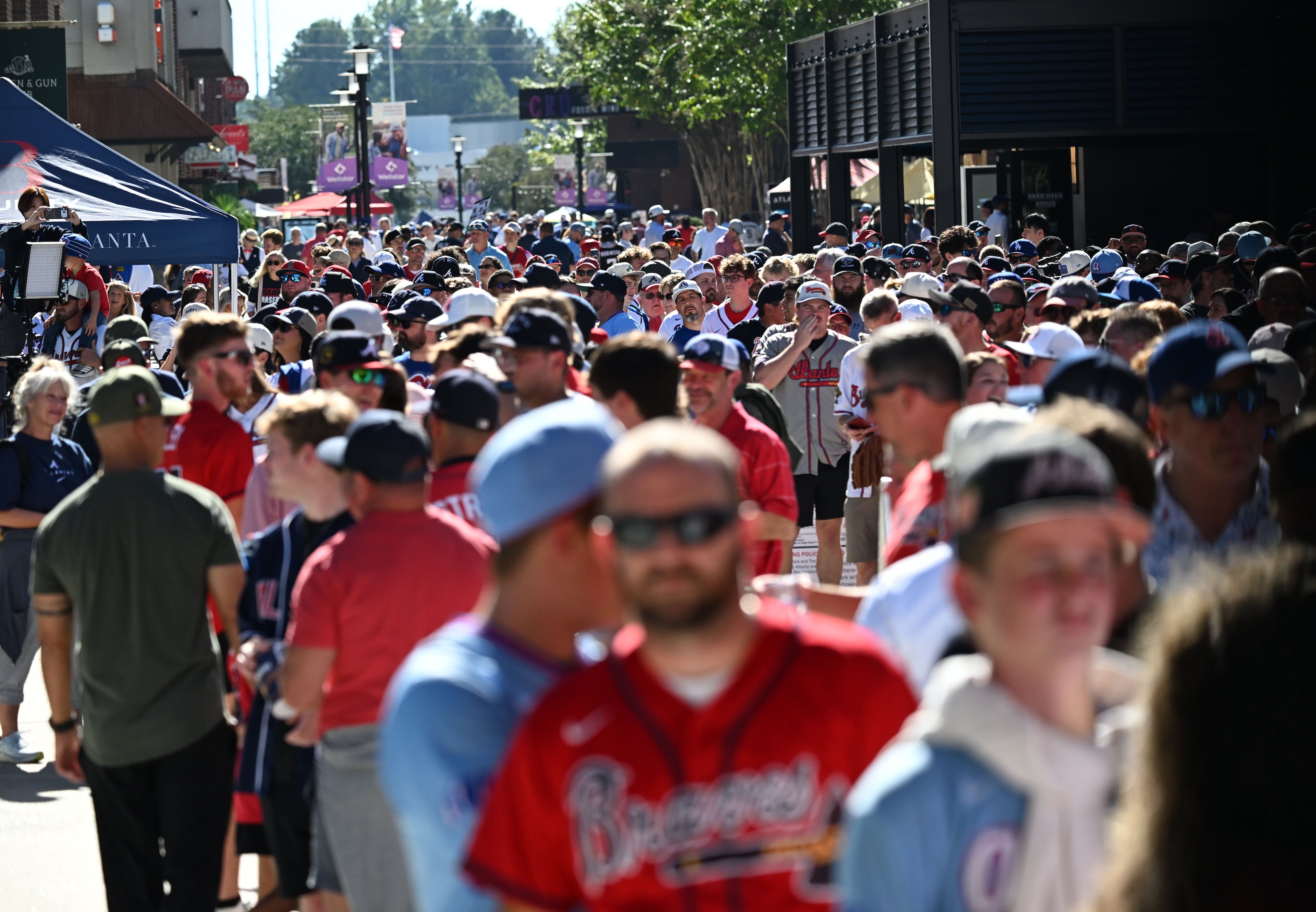 Baseball fans wait for the gates to open before Game 3 of the National League Division Series between Atlanta Braves and Los Angeles Dodgers at Truist Park on Tuesday, Oct. 6, 2026, in Atlanta. (Hyosub Shin/AJC)