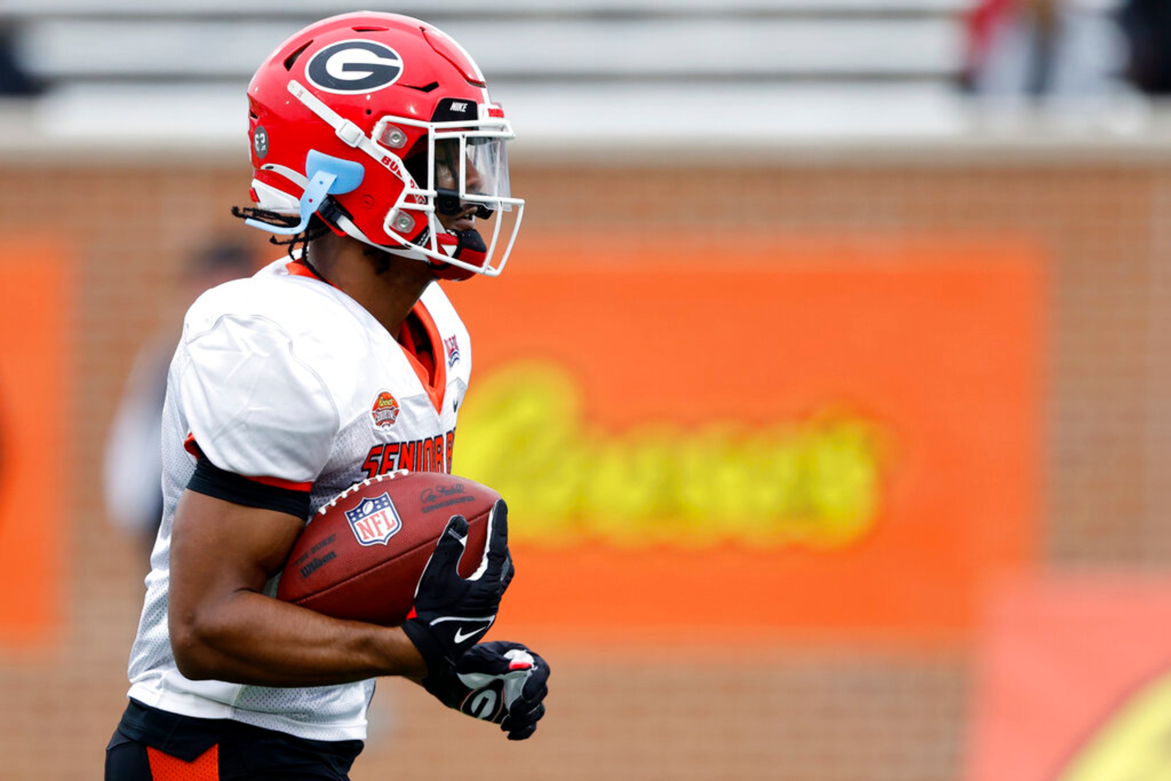 American running back Kenny McIntosh of Georgia (6) runs through drills during practice for the Senior Bowl NCAA college football game Thursday, Feb. 2, 2023, in Mobile, Ala.. (AP Photo/Butch Dill)