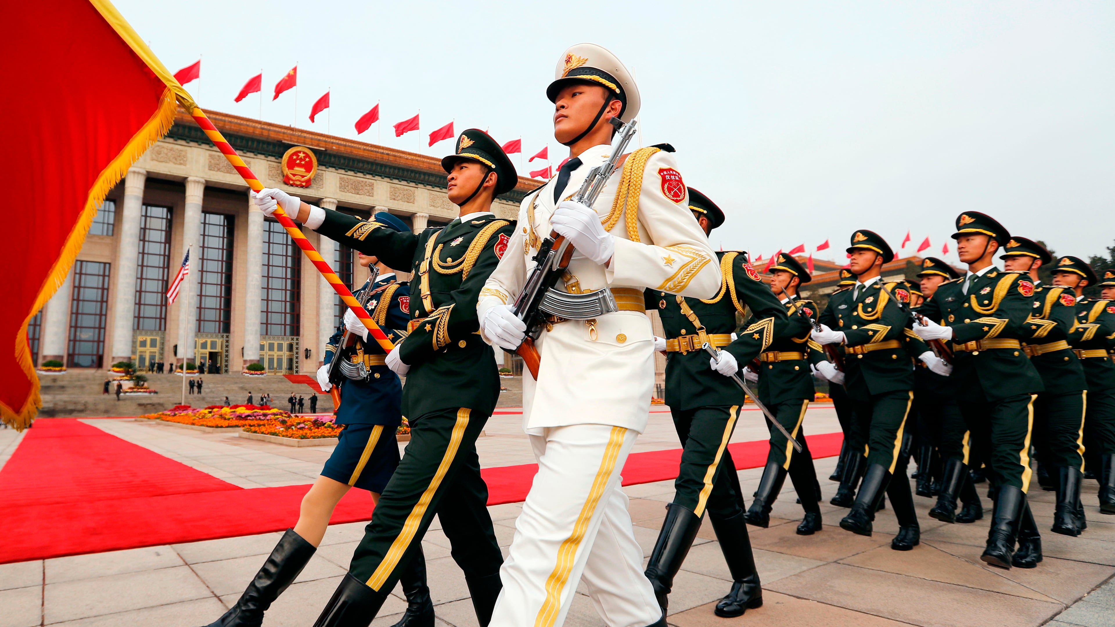 FILE - Members of an honor guard march as they prepare for a welcome ceremony for visiting U.S. President Donald Trump outside the Great Hall of the People in Beijing, Nov. 9, 2017. (AP Photo/Andy Wong, File)
