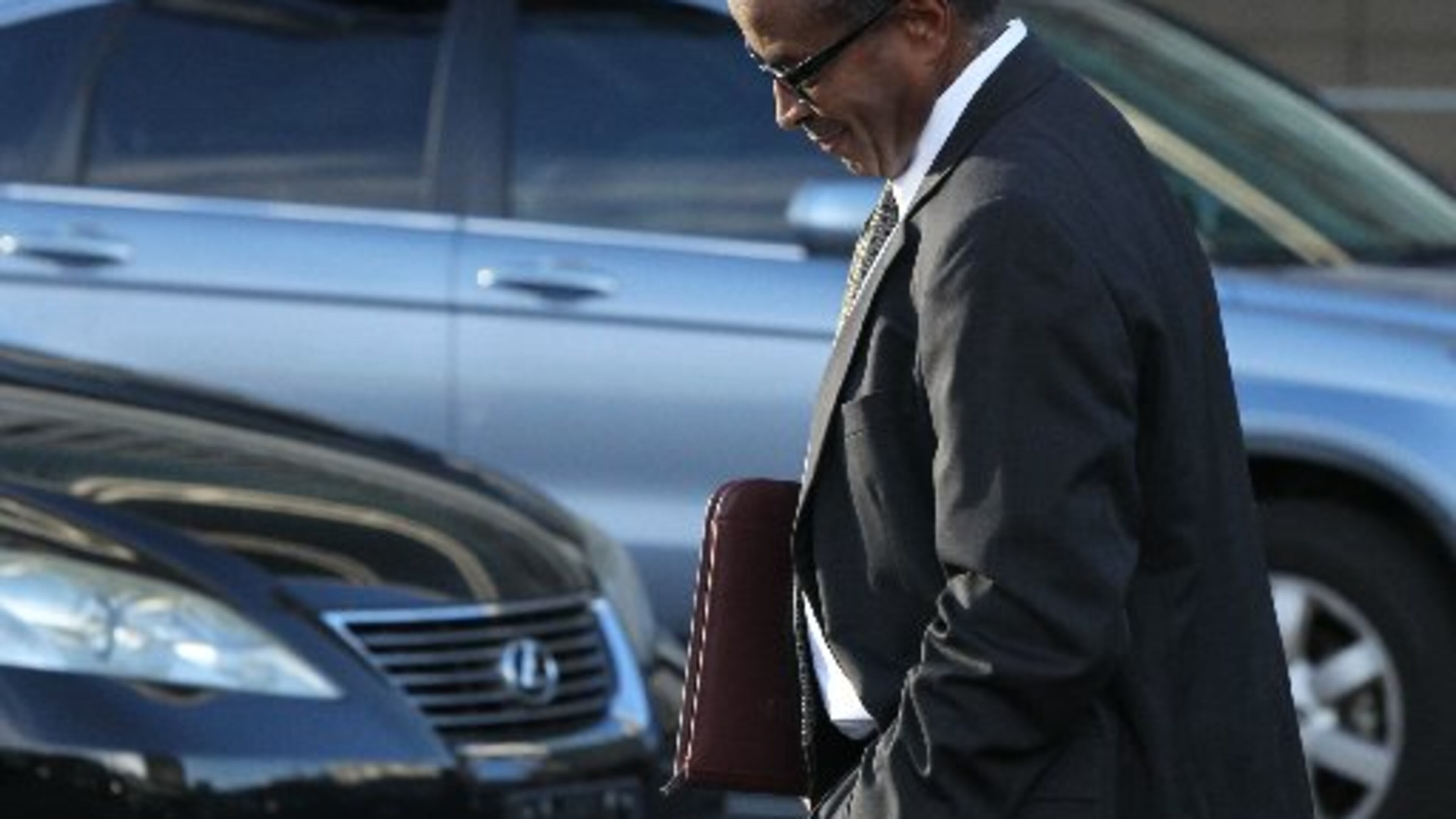 Elvin “E.R.” Mitchell leaving the federal courthouse in Atlanta after pleading guilty to one count of conspiracy to commit bribery and launder money. HENRY TAYLOR/HENRY.TAYLOR@AJC.COM