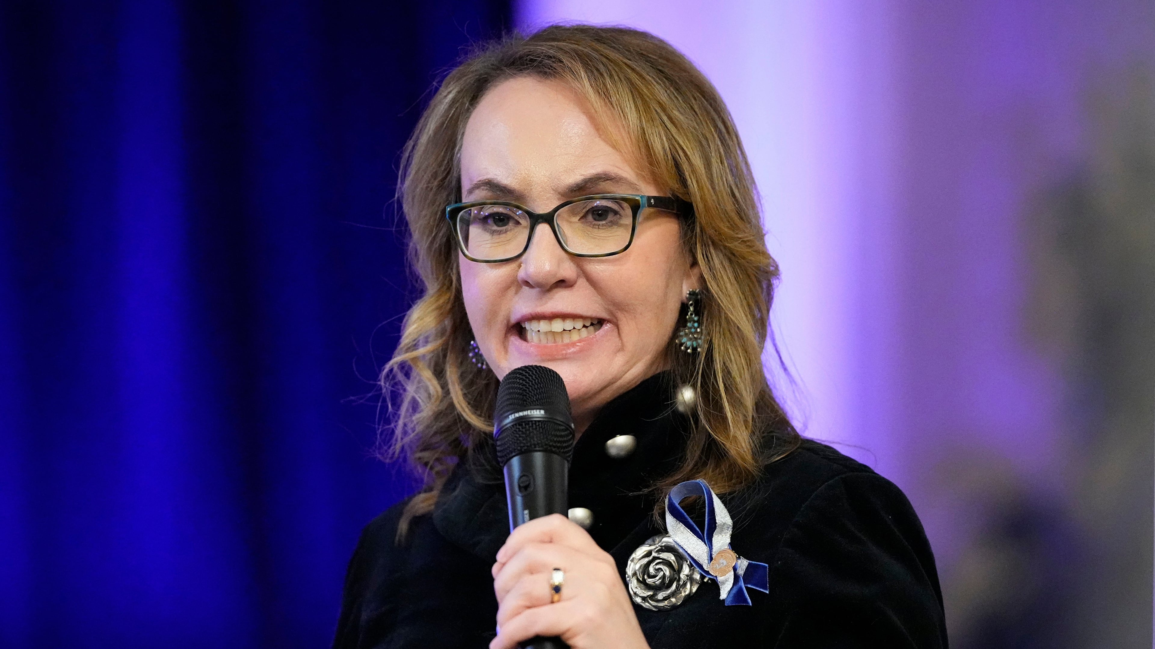 FILE - Former Arizona Rep. Gabby Giffords talks during a vigil remembering the 25th anniversary of the Columbine High School mass shooting, April 19, 2024, in Denver. (AP Photo/Jack Dempsey, File)