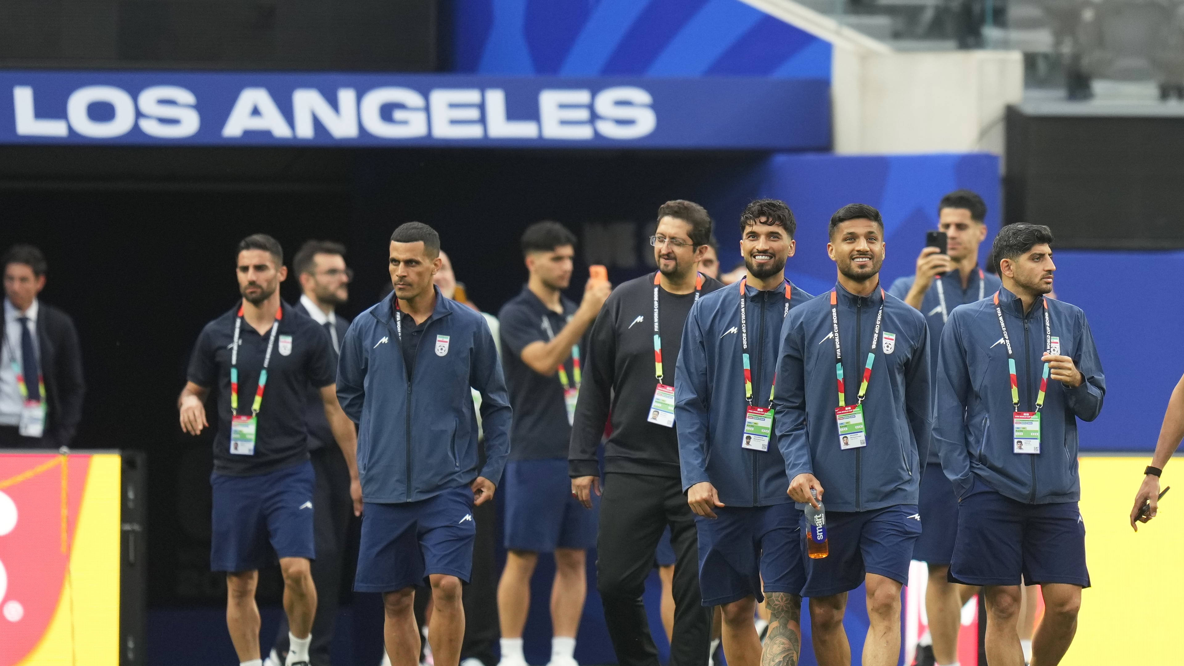 Iran players walk onto the pitch at the stadium one day before their FIFA World Cup match against New Zealand in Inglewood, Calif., near Los Angeles, Sunday, June 14, 2026. (AP Photo/Andre Penner)