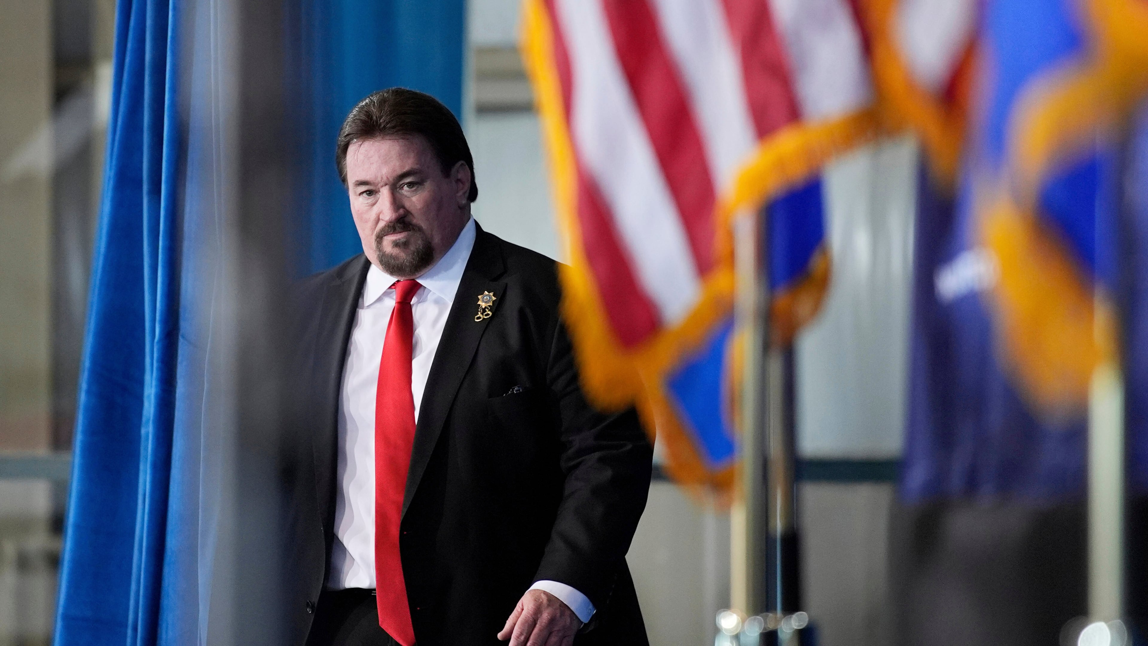 FILE - Nevada GOP chair Michael McDonald walks on stage before speaking ahead of Republican presidential candidate former President Donald Trump at a campaign event, Jan. 27, 2024, in Las Vegas. (AP Photo/John Locher, File)