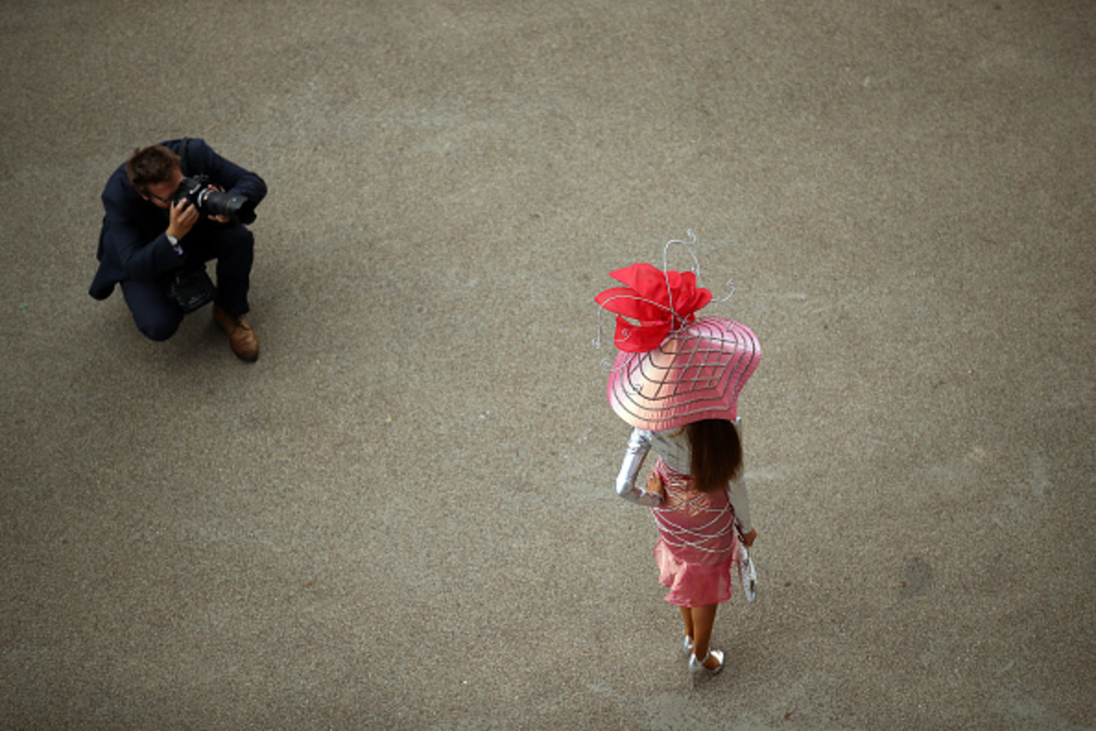 ASCOT, ENGLAND - JUNE 19: Racegoers attend day two of Royal Ascot at Ascot Racecourse on June 19, 2019 in Ascot, England. (Photo by Bryn Lennon/Getty Images for Ascot Racecourse)