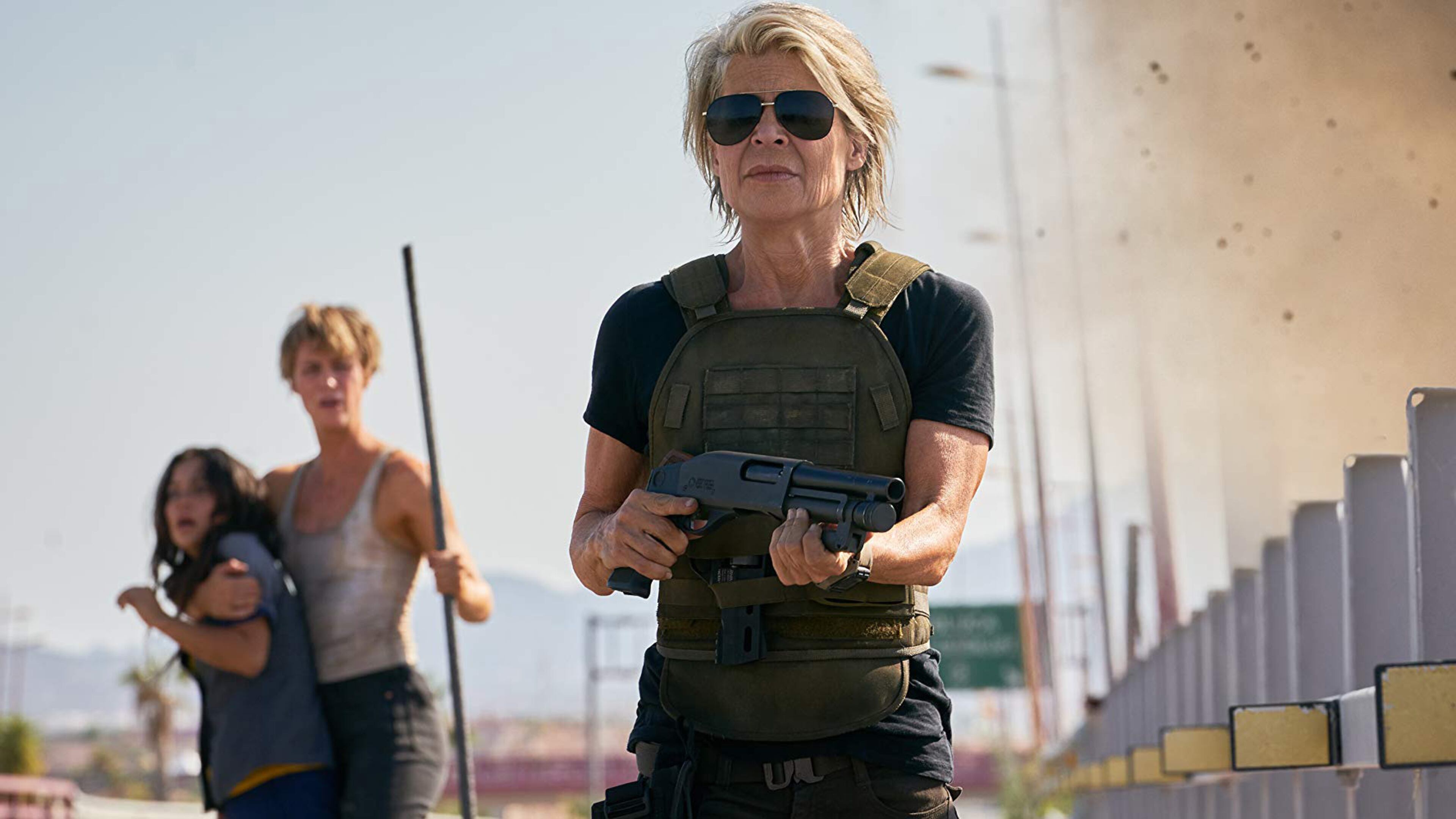 Linda Hamilton in “Terminator: Dark Fate.” In the background are Natalia Reyes and Mackenzie Davis. Paramount Pictures