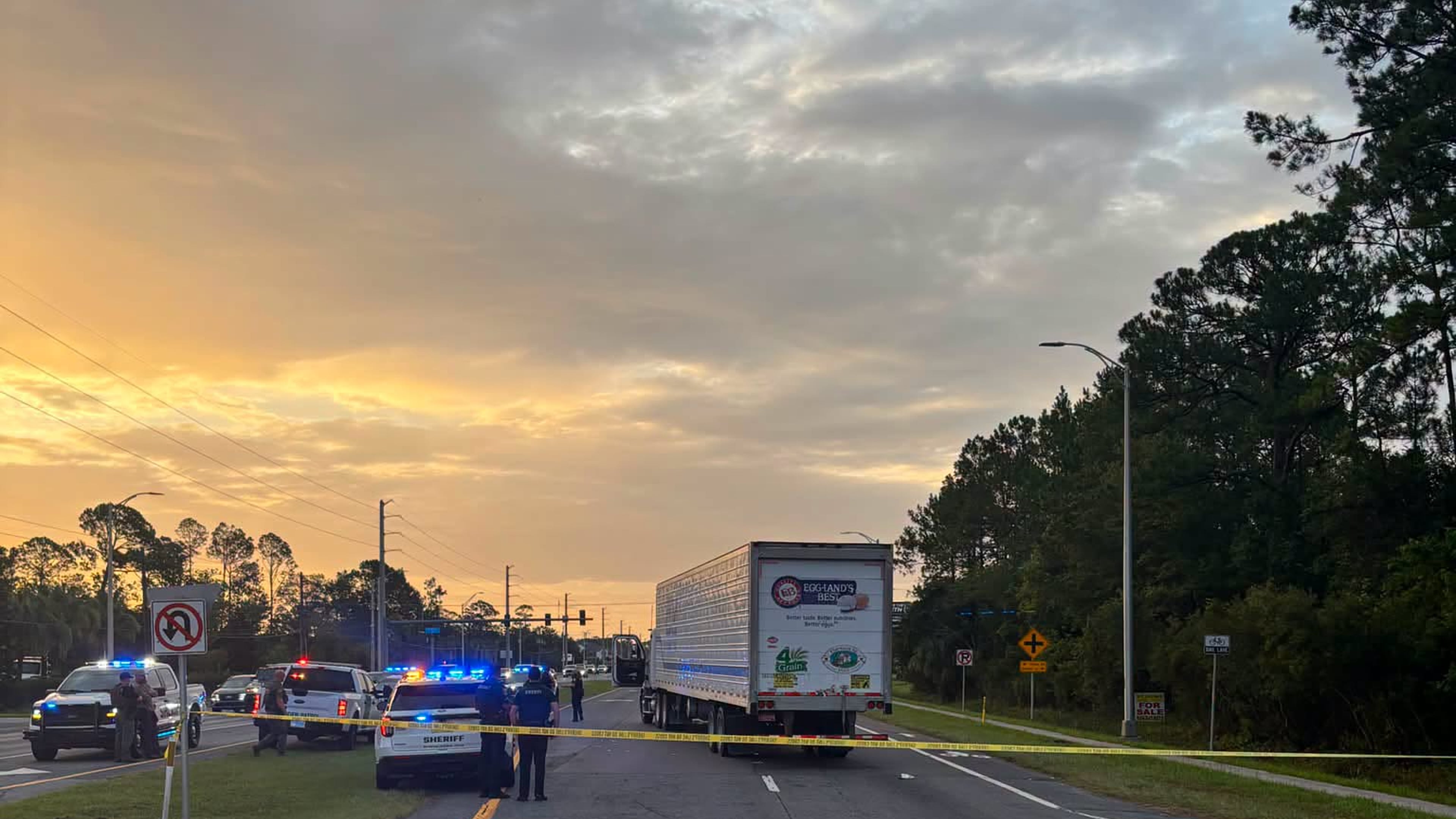 In this photo provided by the St. Johns County Sheriff's Office, the eastbound lanes of SR 16 between Outlet Mall Boulevard and Inman Road in St. Augustine, Fla., are shutdown after a fatal collision. (St. Johns County Sheriff's Office via AP)