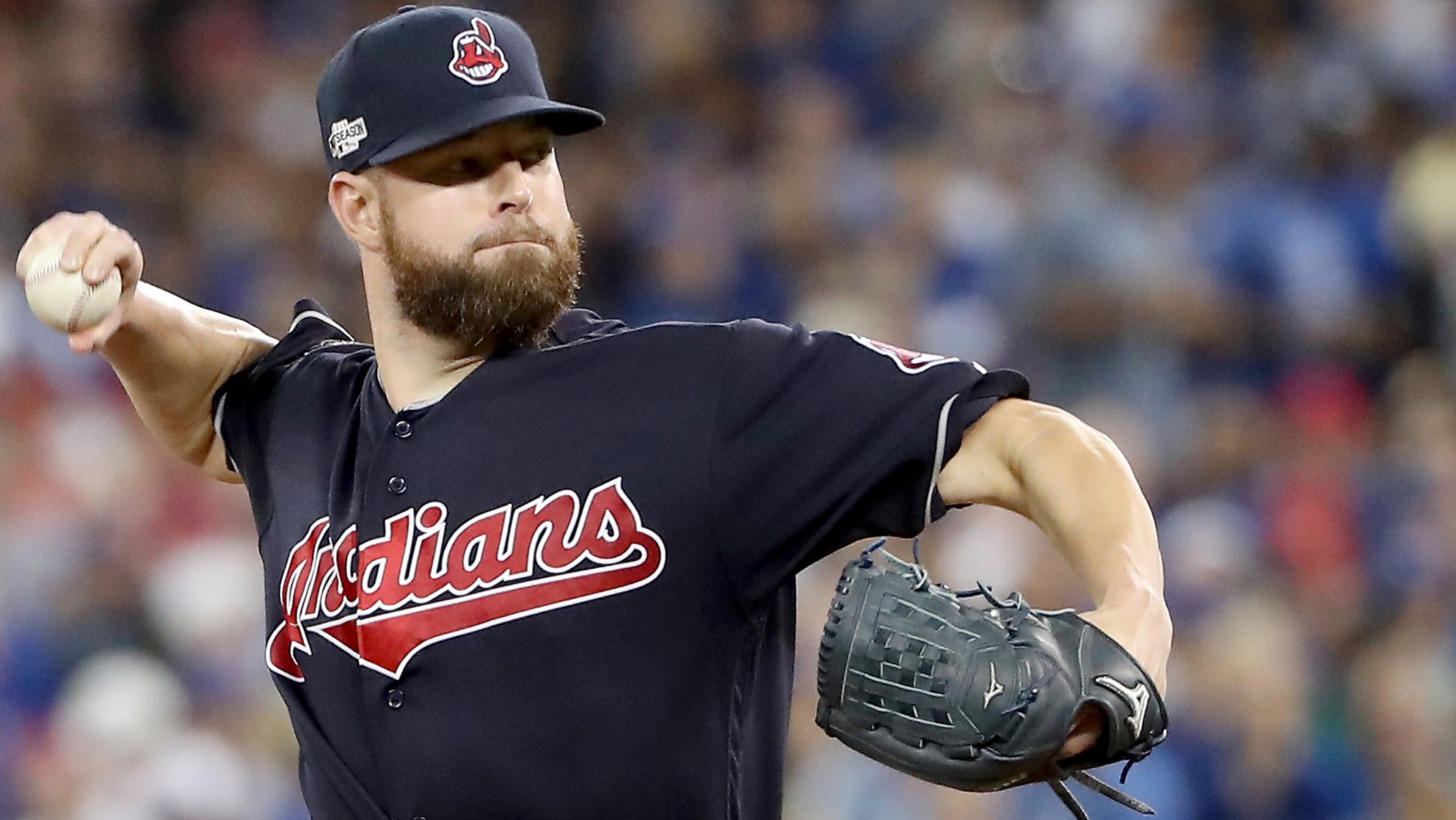 TORONTO, ON - OCTOBER 18: Corey Kluber #28 of the Cleveland Indians throws a pitch in the second inning against the Toronto Blue Jays during game four of the American League Championship Series at Rogers Centre on October 18, 2016 in Toronto, Canada. (Photo by Tom Szczerbowski/Getty Images)