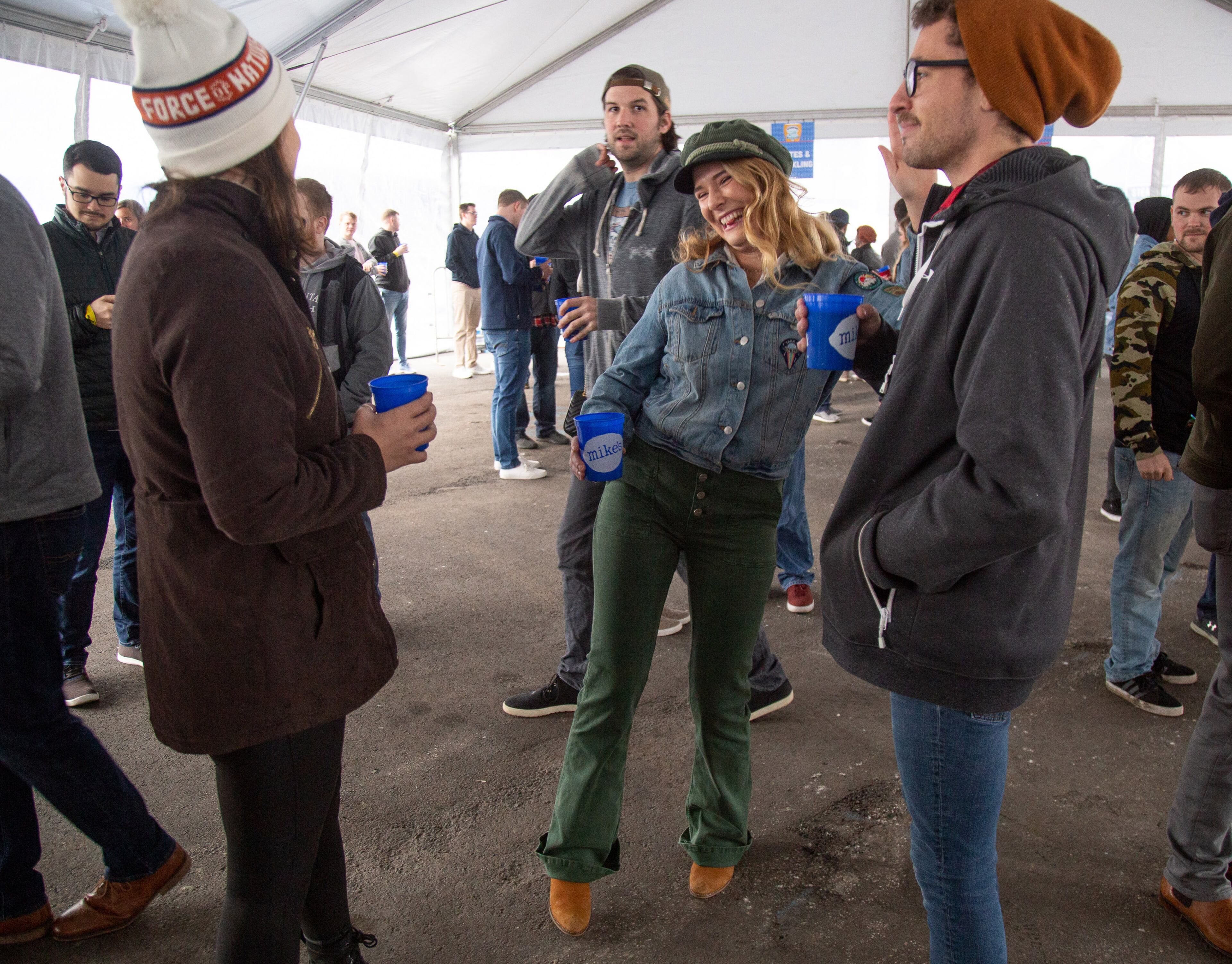 Katherin Francesconi (C) dances to the music played by DJ Qtip in the heated tent during the Atlanta Winter Beer Festival at Atlantic Station on Saturday, February 1, 2020. STEVE SCHAEFER / SPECIAL TO THE AJC