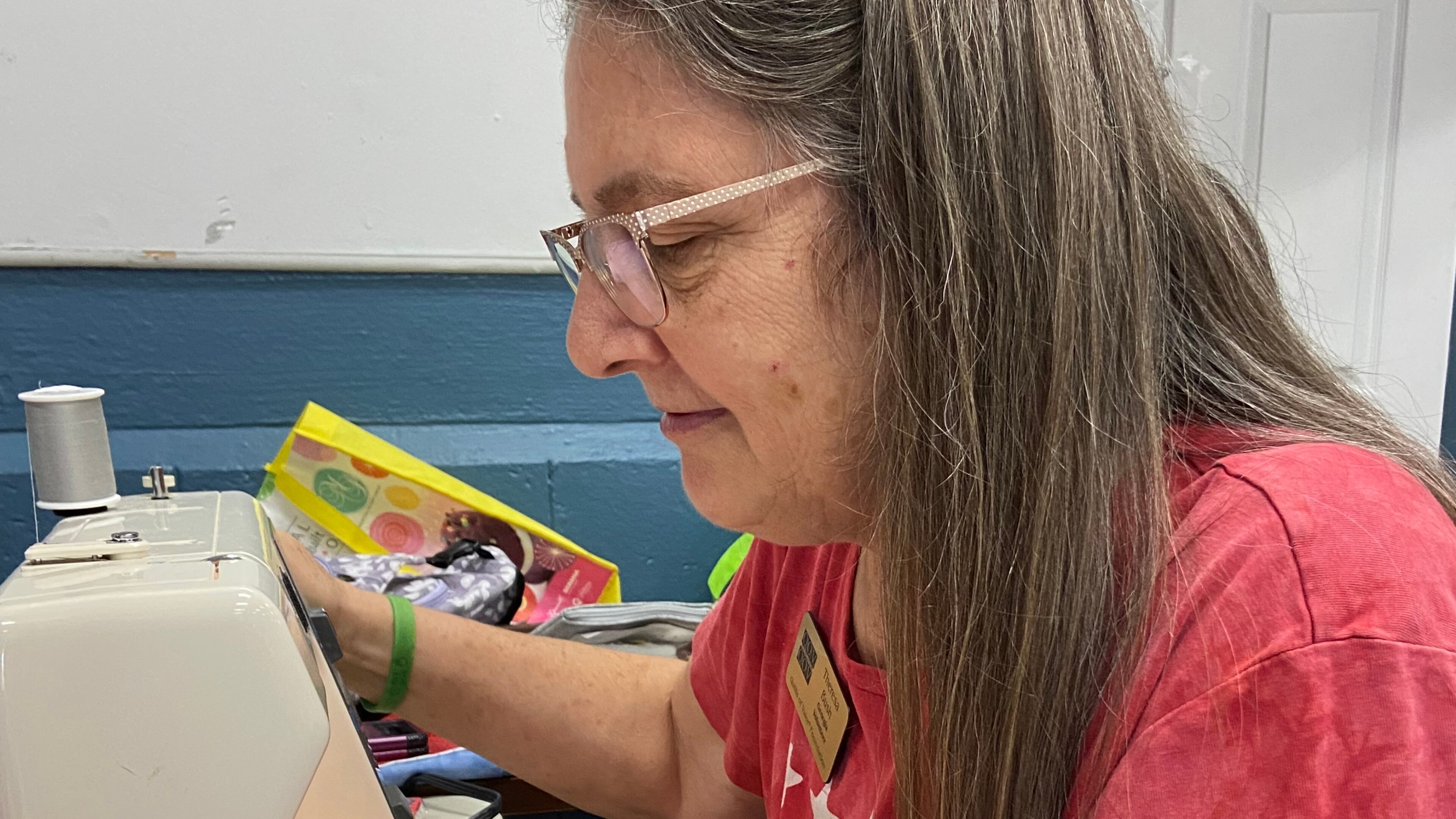 Theresa Bush of the Coweta County Quilts for Valor works on a new gift for a veteran. Courtesy