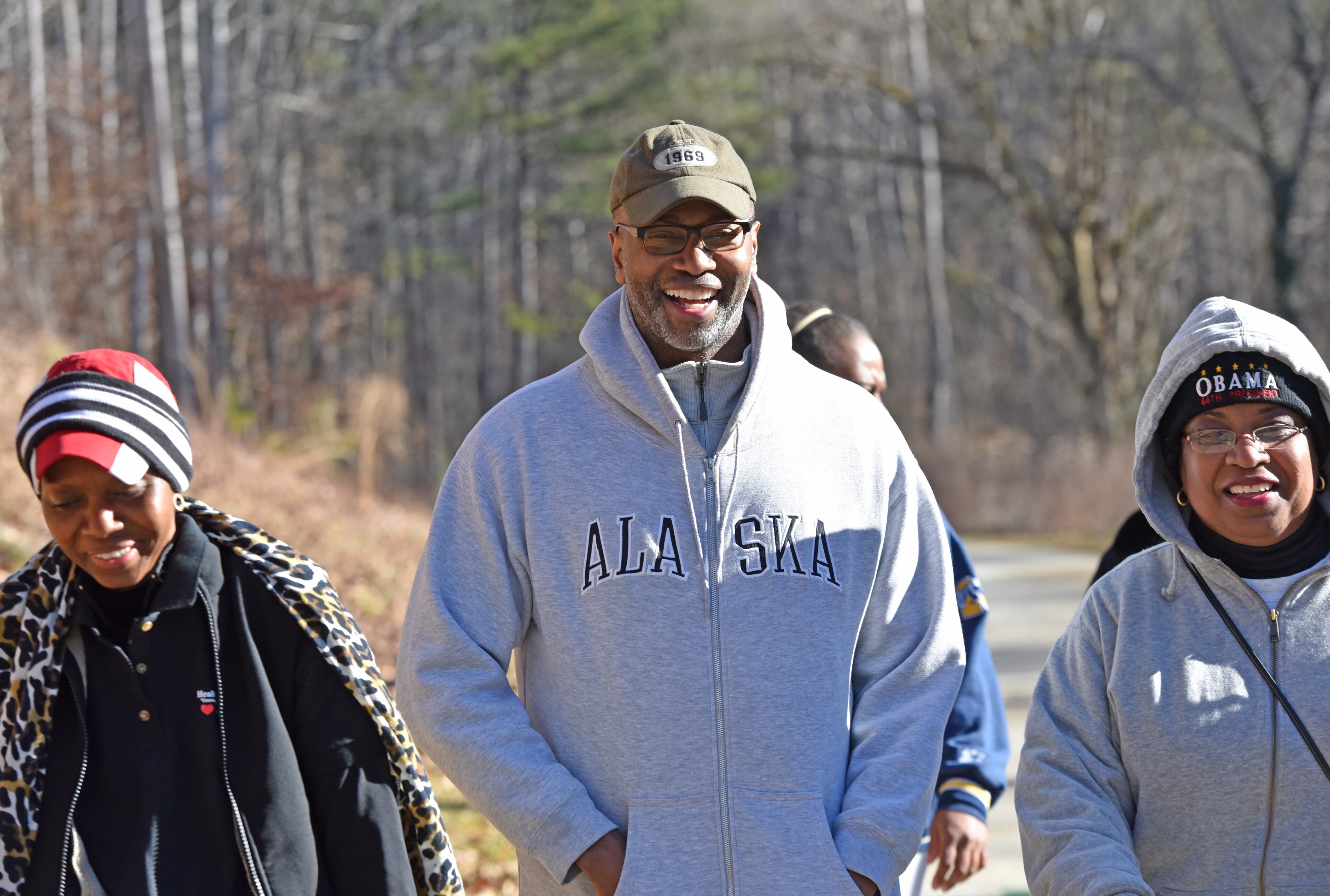 Dr. Charles Moore (center) smiles as he talks with his patients Cornelia King (left) and Janet Lane Martin during their health education walk at Lionel Hampton-Beecher Hills Park in southwest Atlanta. HYOSUB SHIN / HSHIN@AJC.COM