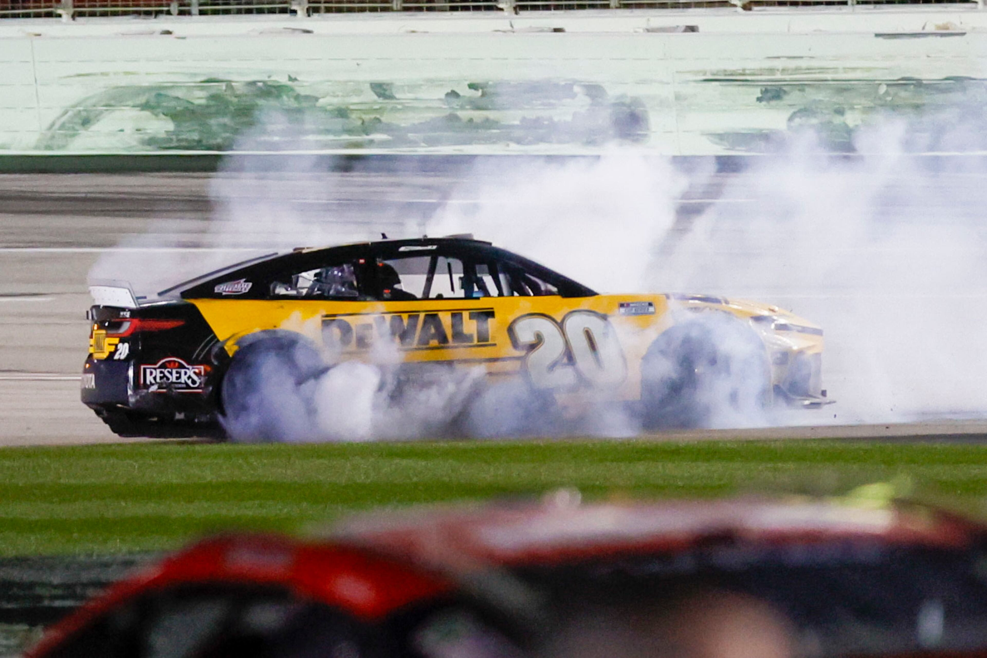 NASCAR Cup driver Christopher Bell (20) celebrates with a burnout after winning the Ambetter Health 400 NASCAR race at Atlanta Motor Speedway on Sunday, Feb. 23, 2025.
(Miguel Martinez/ AJC)