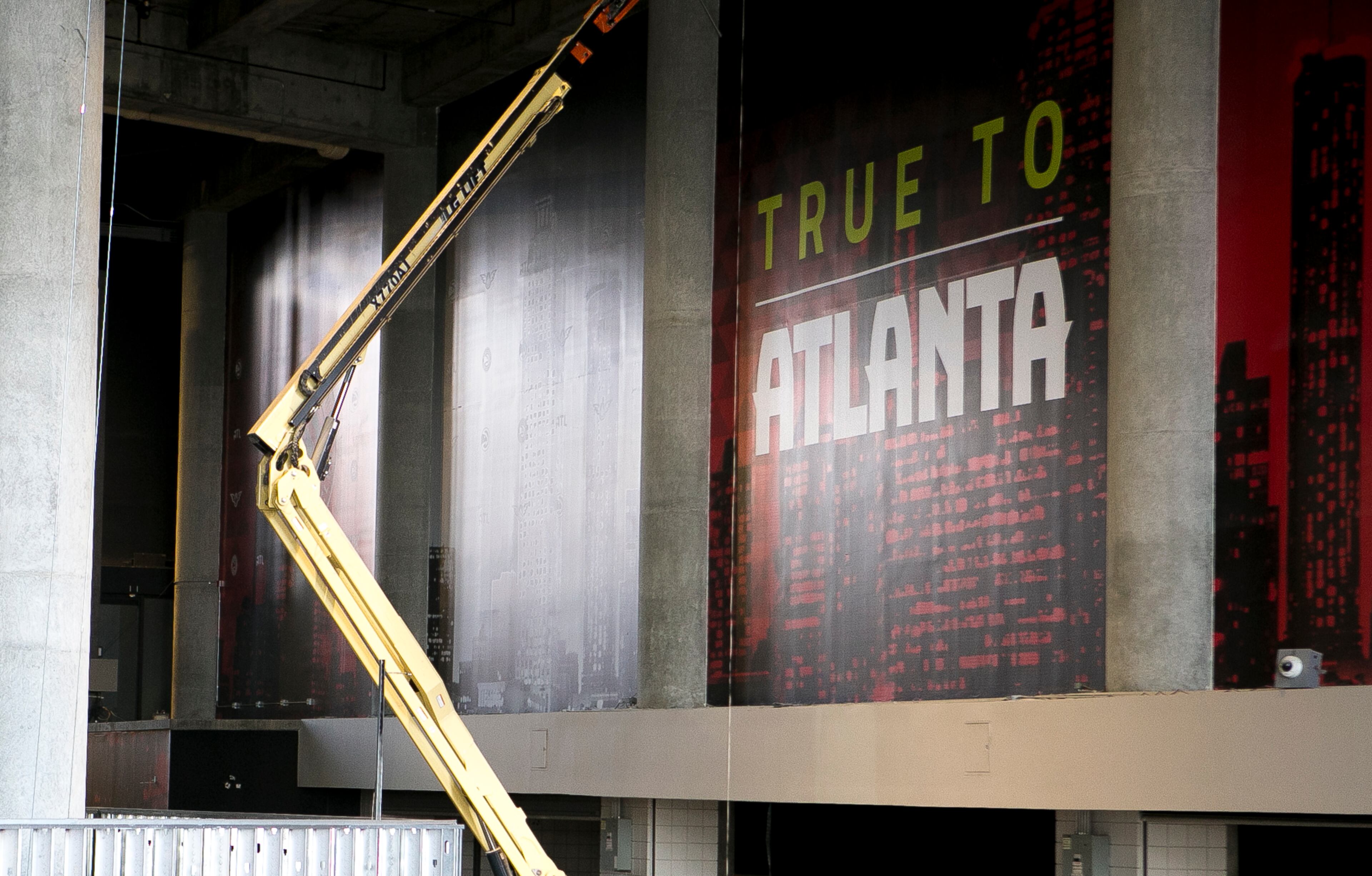 A wall graphic is seen during a guided media tour through the in-progress renovations at the State Farm Arena in Atlanta, Ga., on Thurs., Sept. 20, 2018. The renovations, which total $192.5 million, are on track to be completed by the arena's scheduled open house on October 20. The current rate of progress is about $1 million of work per day, according to Brett Stefansson, Atlanta Hawks executive vice president and general manager of State Farm Arena. (CASEY SYKES, CASEYLANESYKES@GMAIL.COM)